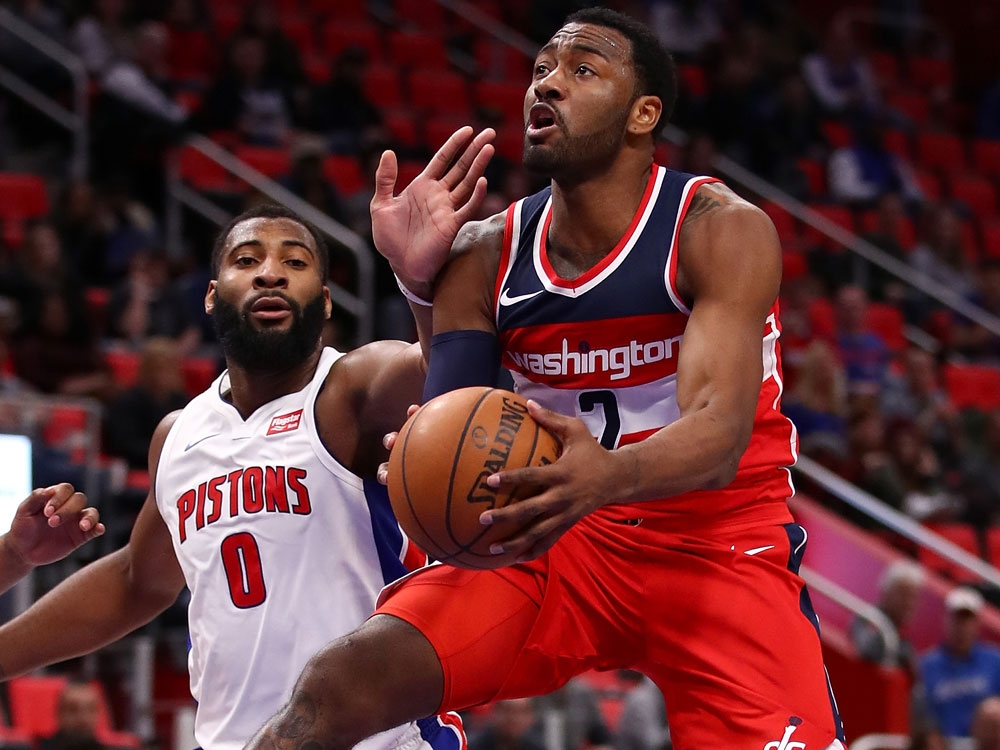 John Wall of the Washington Wizards tries to get a shot off around Andre Drummond of the Detroit Pistons during the second half at Little Caesars Arena on Jan. 19, 2018 John Wall of the Washington Wizards tries to get a shot off around Andre Drummond of the Detroit Pistons during the second half at Little Caesars Arena on Jan. 19, 2018