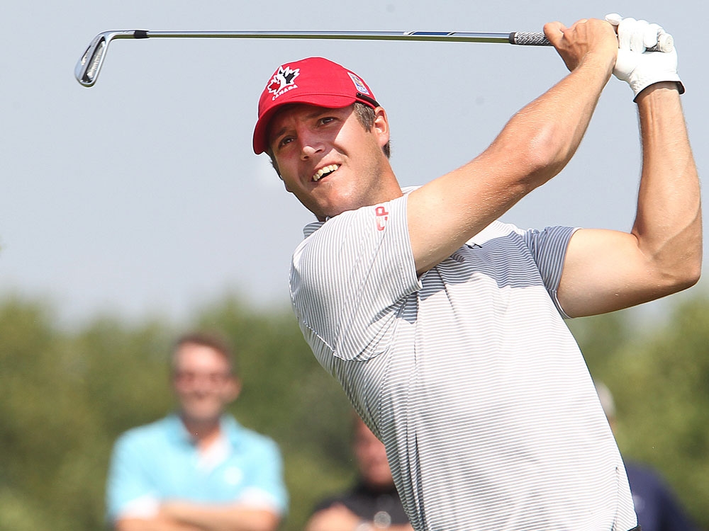 Garrett Rank tees off on the 11th hole during the Canadian Men's Amateur at Southwood Golf Club in Winnipeg on Aug. 4, 2014