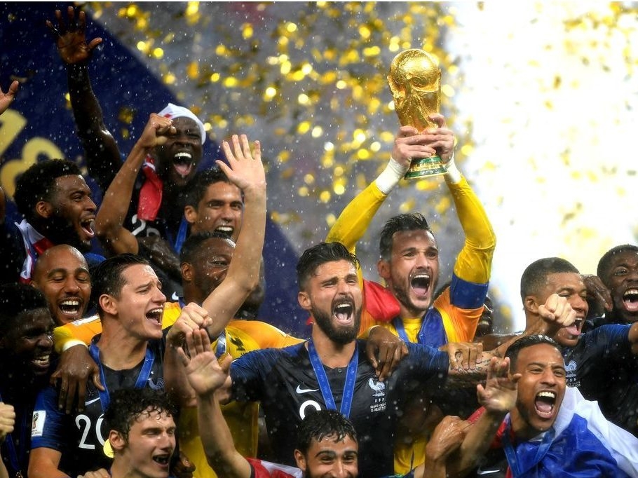 Hugo Lloris of France lifts the World Cup trophy to celebrate with his teammates after during the 2018 FIFA World Cup Final between France and Croatia at Luzhniki Stadium on July 15, 2018 in Moscow, Russia.