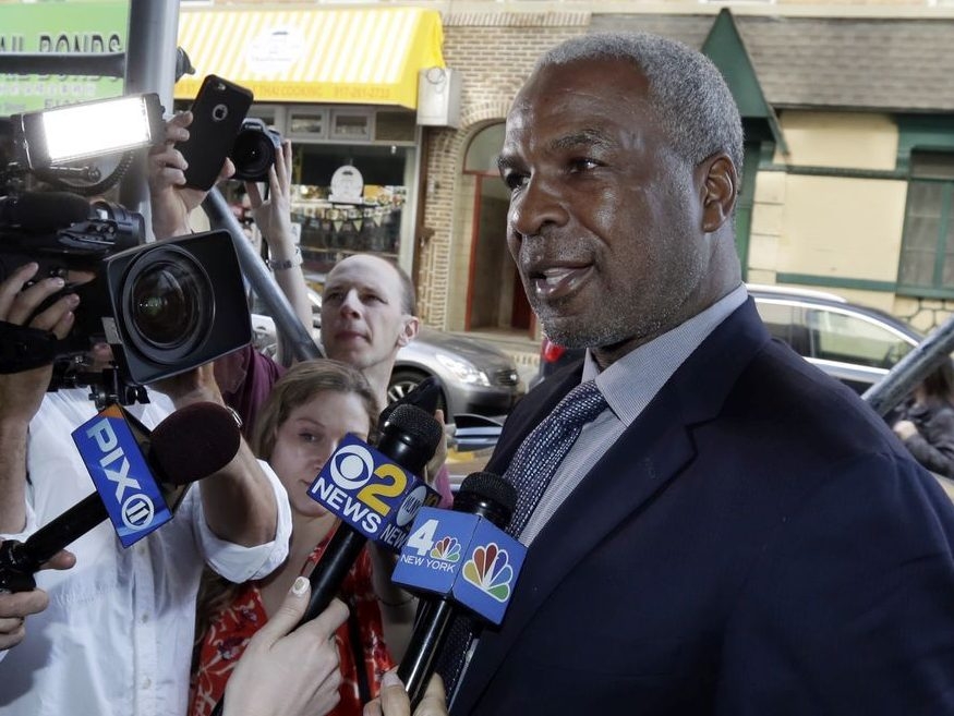 In this April 11, 2017, file photo, former New York Knicks star Charles Oakley talks to the press after an appearance in Manhattan Criminal Court, in New York. 