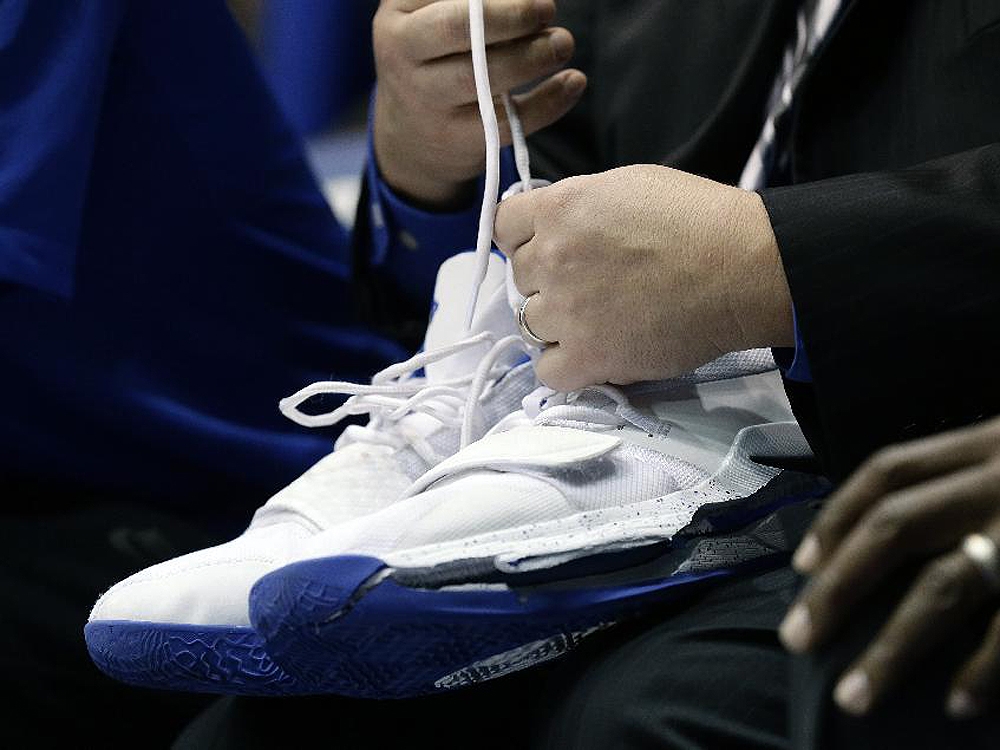 A trainer holds Duke's Zion Williamson's shoes after Williamson left the game due to an injury against North Carolina in Durham, N.C., Wednesday, Feb. 20, 2019. (AP Photo/Gerry Broome) A trainer holds Duke's Zion Williamson's shoes after Williamson left the game due to an injury against North Carolina in Durham, N.C., Wednesday, Feb. 20, 2019. (AP Photo/Gerry Broome)