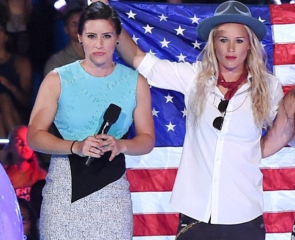 USWNT soccer players Ali Krieger, left, and Ashlyn Harris speak onstage at the Nickelodeon Kids' Choice Sports Awards 2015 at UCLA's Pauley Pavilion on July 16, 2015 in Westwood, California.  (Kevin Winter/Getty Images)