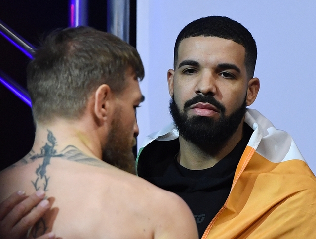 Conor McGregor, left, and rapper Drake attend a ceremonial weigh-in for UFC 229 at T-Mobile Arena on Oct. 5, 2018 in Las Vegas. (Ethan Miller/Getty Images) Conor McGregor, left, and rapper Drake attend a ceremonial weigh-in for UFC 229 at T-Mobile Arena on Oct. 5, 2018 in Las Vegas. (Ethan Miller/Getty Images)
