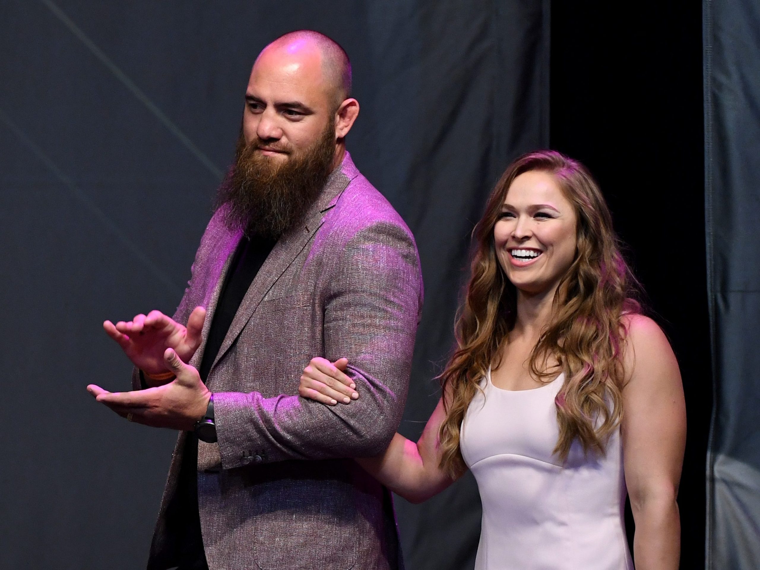 Travis Browne walks onstage with Ronda Rousey as she becomes the first female inducted into the UFC Hall of Fame at The Pearl concert theatre at Palms Casino Resort on July 5, 2018 in Las Vegas, Nevada. (Ethan Miller/Getty Images) Travis Browne walks onstage with Ronda Rousey as she becomes the first female inducted into the UFC Hall of Fame at The Pearl concert theatre at Palms Casino Resort on July 5, 2018 in Las Vegas, Nevada. (Ethan Miller/Getty Images)