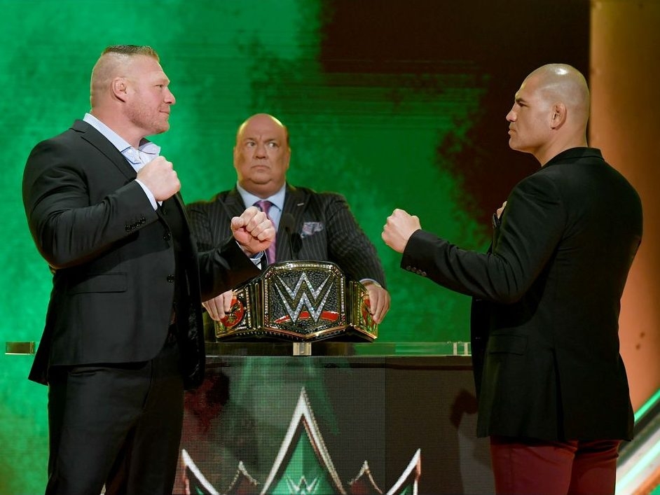 WWE champion Brock Lesnar and former UFC heavyweight champion Cain Velasquez face off as Lesnar's advocate Paul Heyman looks on during the announcement of their match at a WWE news conference at T-Mobile Arena on October 11, 2019 in Las Vegas, Nevada. Lesnar will face Velasquez and WWE wrestler Braun Strowman will take on heavyweight boxer Tyson Fury at the WWE's Crown Jewel event at Fahd International Stadium in Riyadh, Saudi Arabia on October 31. WWE champion Brock Lesnar and former UFC heavyweight champion Cain Velasquez face off as Lesnar's advocate Paul Heyman looks on during the announcement of their match at a WWE news conference at T-Mobile Arena on October 11, 2019 in Las Vegas, Nevada. Lesnar will face Velasquez and WWE wrestler Braun Strowman will take on heavyweight boxer Tyson Fury at the WWE's Crown Jewel event at Fahd International Stadium in Riyadh, Saudi Arabia on October 31.
