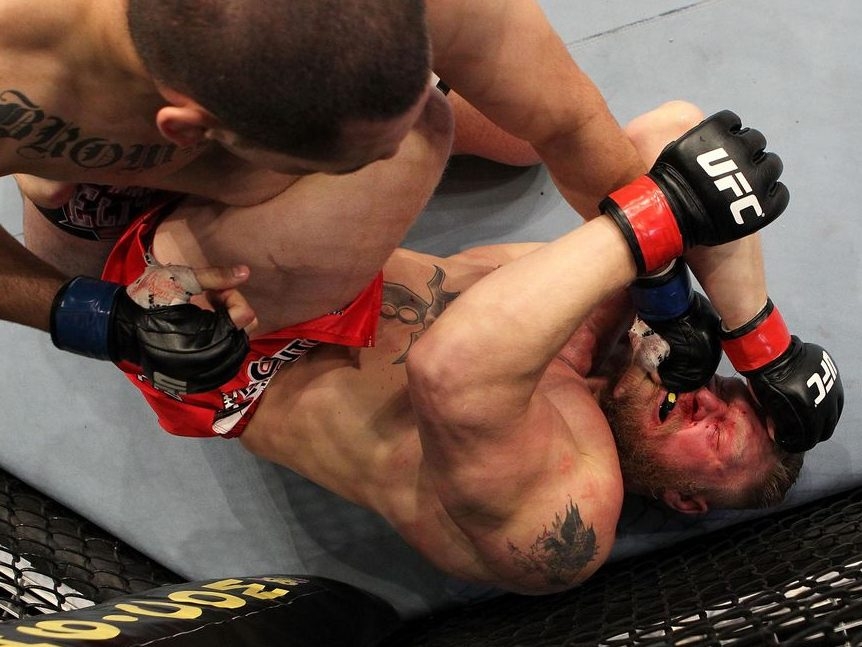 Cain Velasquez connects on a left to the face of Brock Lesnar in the first round during the heavyweight title bout during UFC 121 on October 23, 2010 in Anaheim, California. Velasquez defeated Lesnar by first-round TKO to become the new UFC heavyweight champion. (Getty Images) Cain Velasquez connects on a left to the face of Brock Lesnar in the first round during the heavyweight title bout during UFC 121 on October 23, 2010 in Anaheim, California. Velasquez defeated Lesnar by first-round TKO to become the new UFC heavyweight champion. (Getty Images)