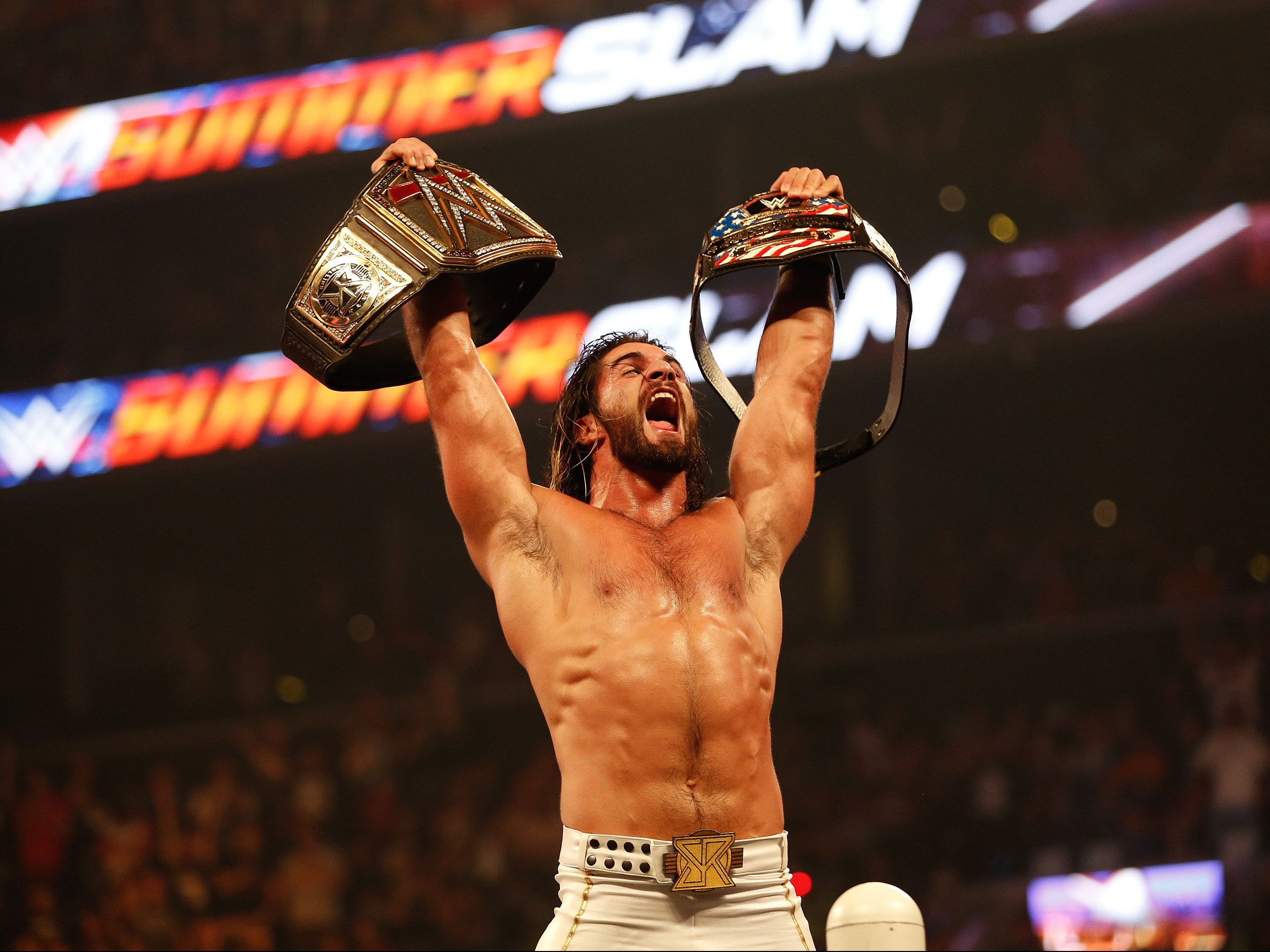 Seth Rollins celebrates his victory over John Cena at the WWE SummerSlam 2015 at Barclays Center of Brooklyn on August 23, 2015 in New York City. Seth Rollins celebrates his victory over John Cena at the WWE SummerSlam 2015 at Barclays Center of Brooklyn on August 23, 2015 in New York City.