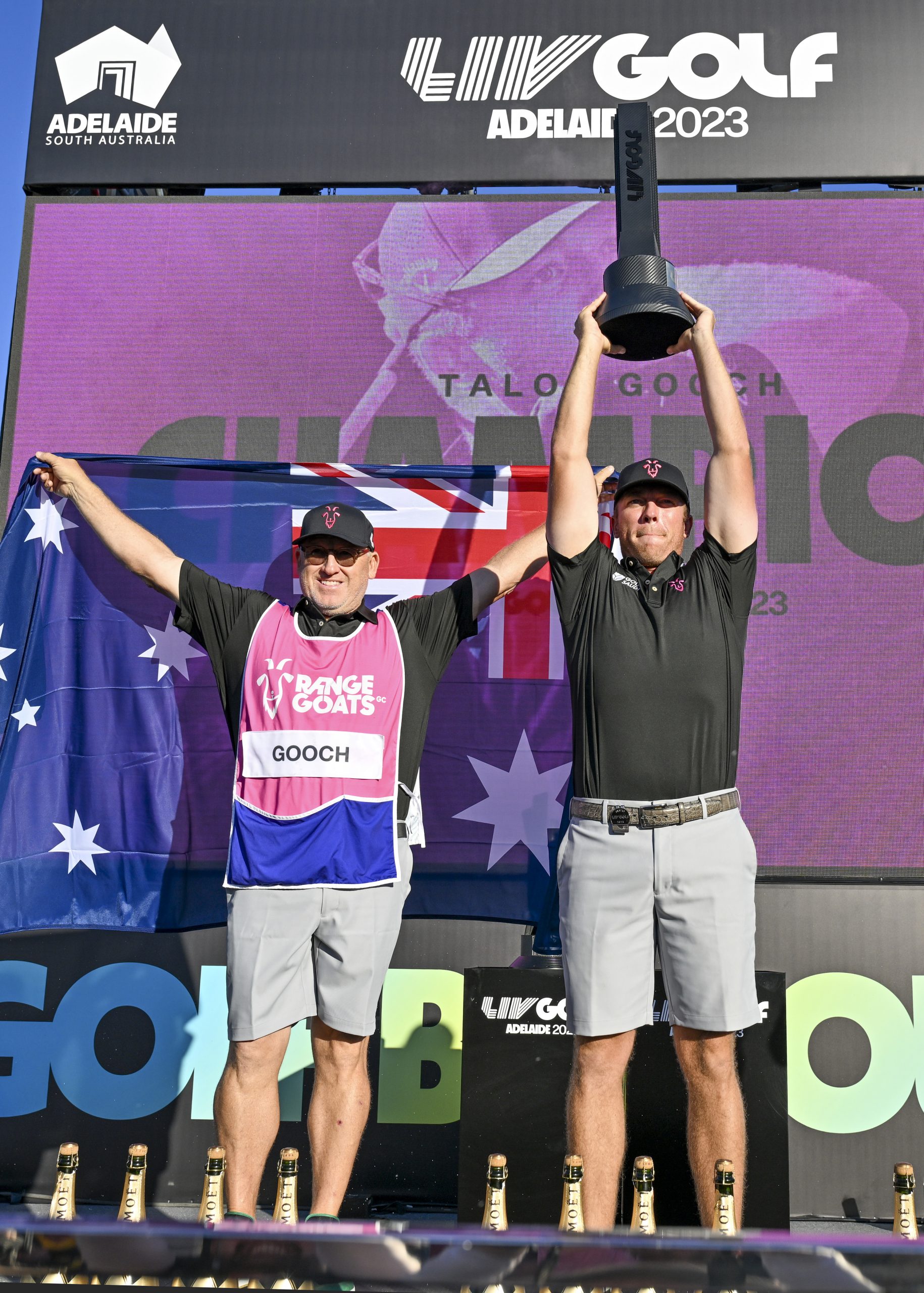 Talor Gooch of the RangeGoats holds up the LIV Golf trophy in Adelaiade.
