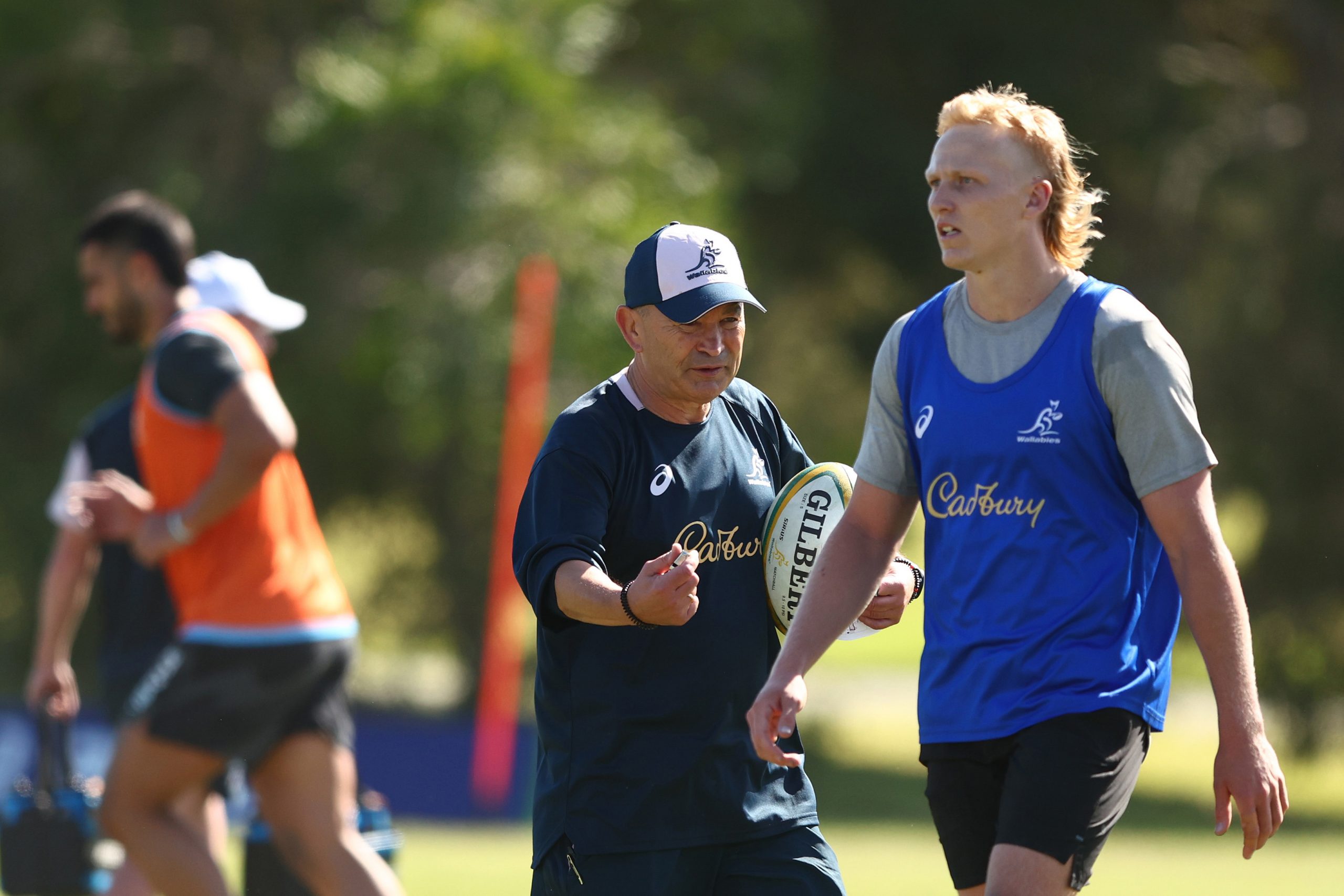 Wallabies coach Eddie Jones watches Carter Gordon.