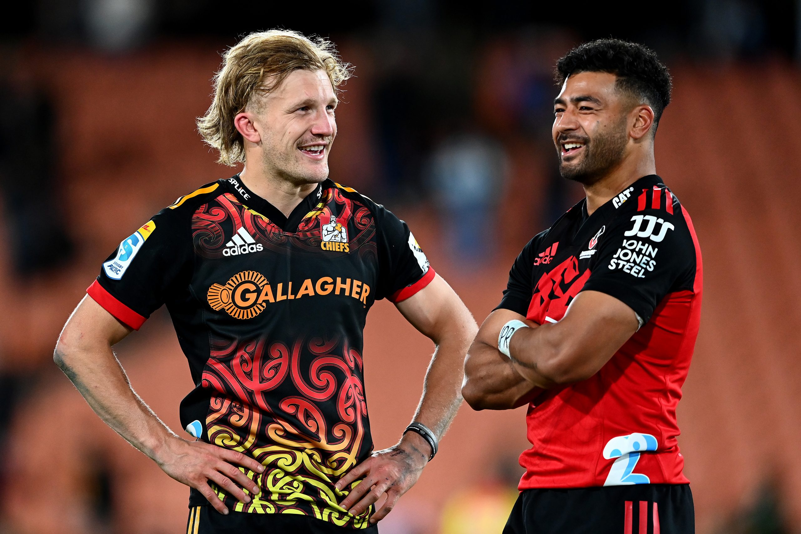 Damian McKenzie of the Chiefs and Richie Mo'unga of the Crusaders talk.