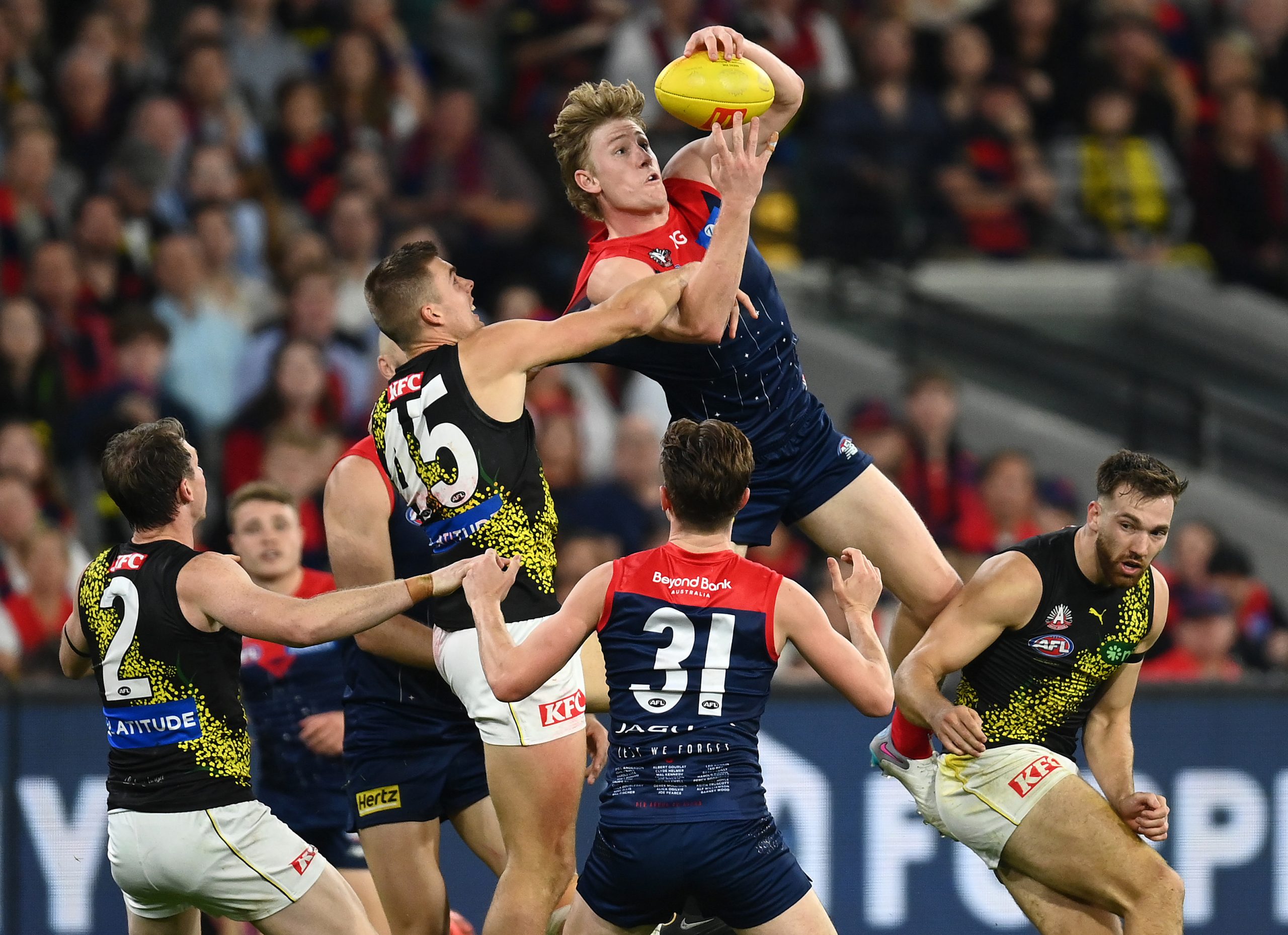 MELBOURNE, AUSTRALIA - APRIL 24: Jacob Van Rooyen of the Demons marks during the round six AFL match between Melbourne Demons and Richmond Tigers at Melbourne Cricket Ground, on April 24, 2023, in Melbourne, Australia. (Photo by Quinn Rooney/Getty Images)