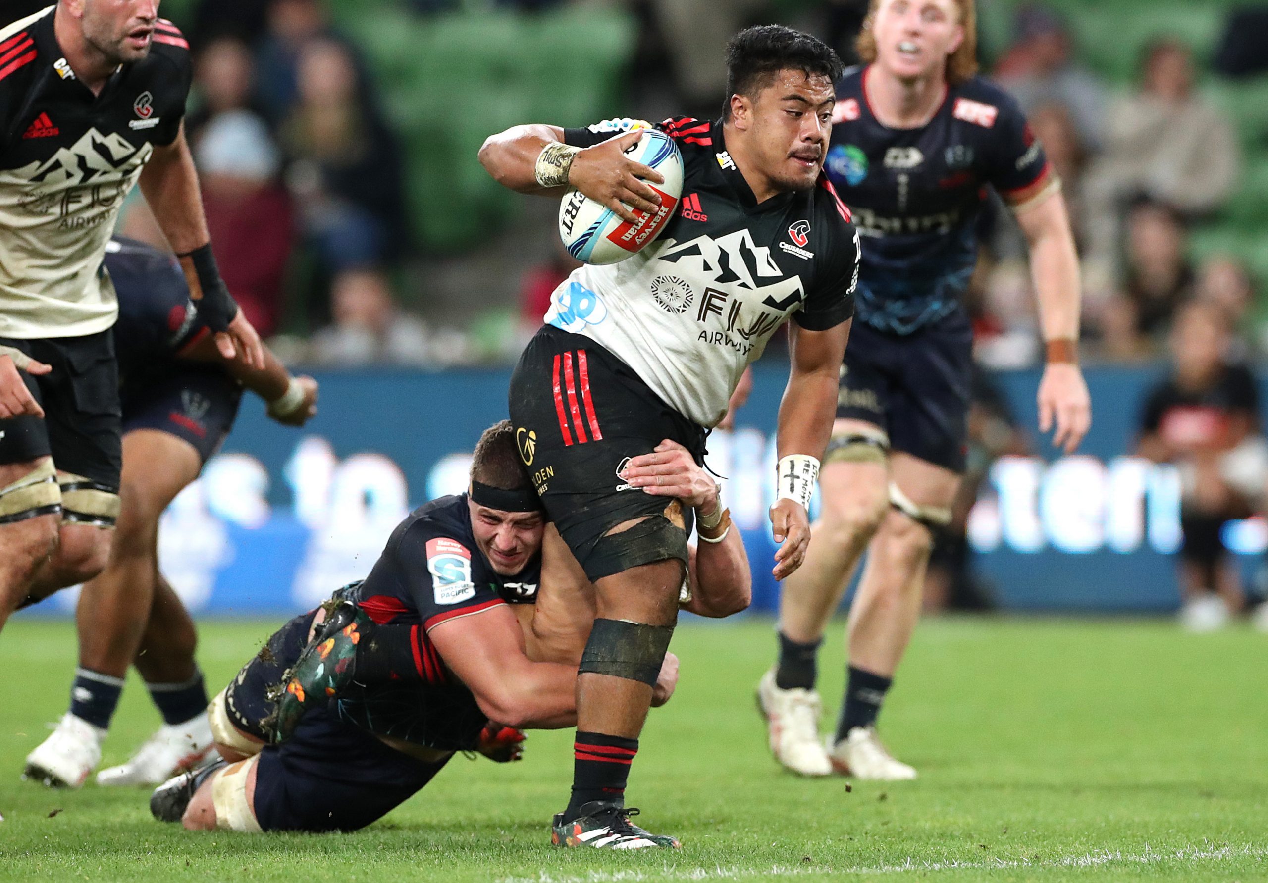 Ioane Moananu of the Crusaders on the way to scoring a try.