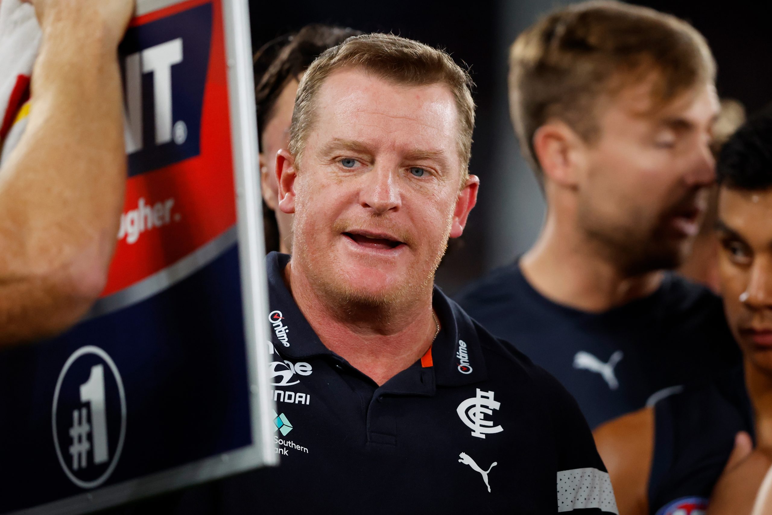MELBOURNE, AUSTRALIA - APRIL 23: Michael Voss, Senior Coach of the Blues addresses his players during the 2023 AFL Round 06 match between the Carlton Blues and the St Kilda Saints at Marvel Stadium on April 23, 2023 in Melbourne, Australia. (Photo by Dylan Burns/AFL Photos)