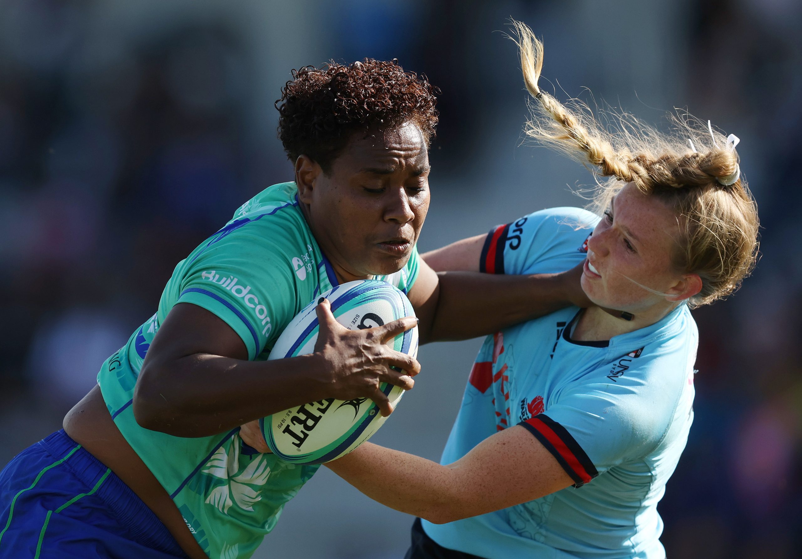 Karalaini Naisewa of Fijiana Drua is tackled by Jade Sheridan of the Waratahs.