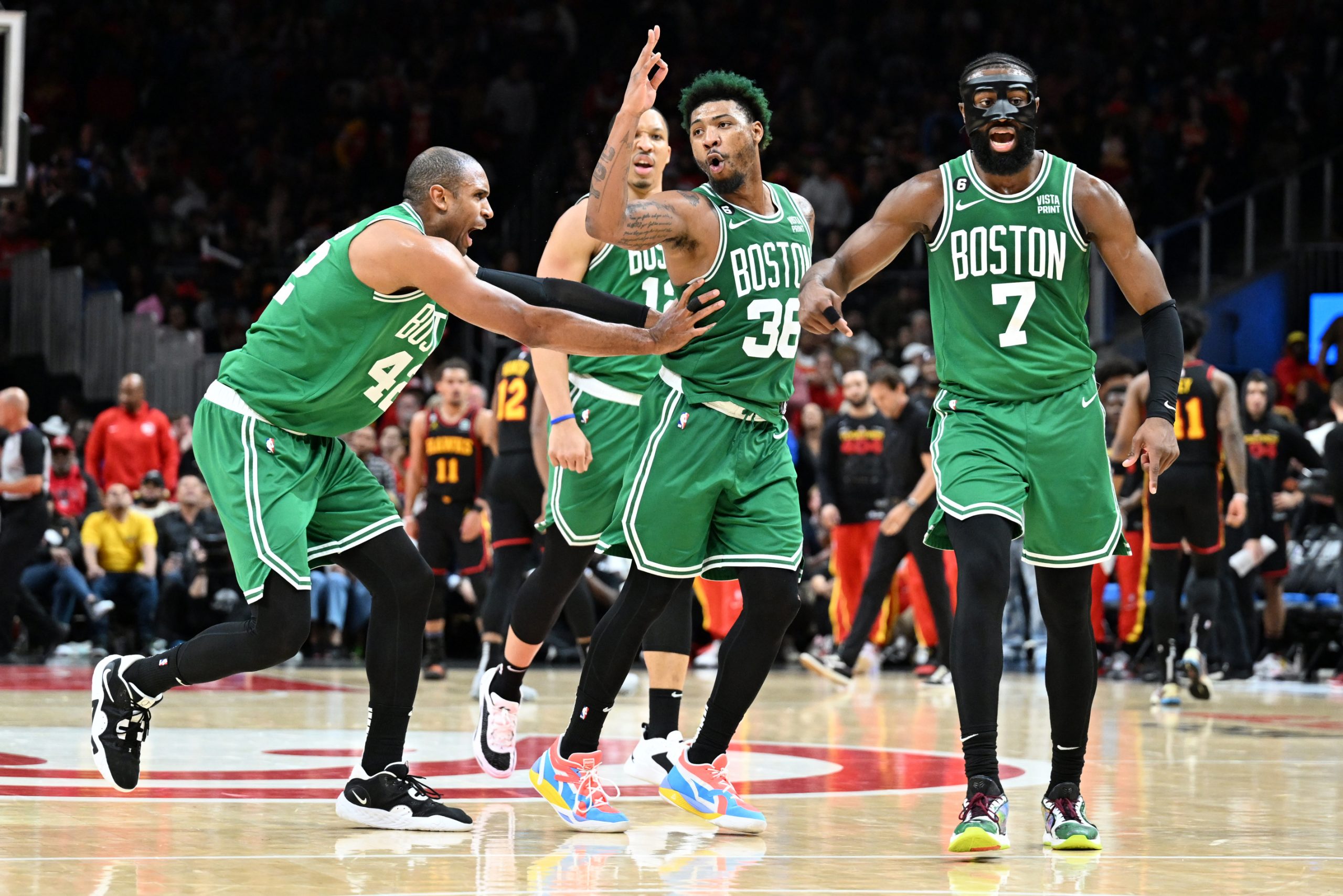 ATLANTA, GA - JANUARY 1: Marcus Smart #36 of the Boston Celtics celebrates a play during the game against the Atlanta Hawks during Round 1 Game 6 of the 2023 NBA Playoffs on January 1, 2023 at State Farm Arena in Atlanta, Georgia. NOTE TO USER: User expressly acknowledges and agrees that, by downloading and/or using this Photograph, user is consenting to the terms and conditions of the Getty Images License Agreement. Mandatory Copyright Notice: Copyright 2023 NBAE (Photo by Adam Hagy/NBAE via G
