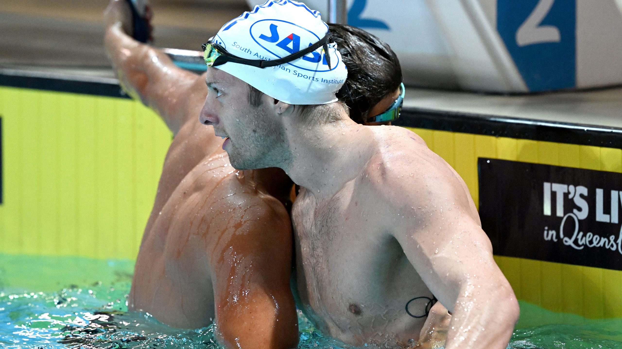Matthew Temple celebrates victory in the men's 100m butterfly at the 2023 Australian Swimming Championships. 