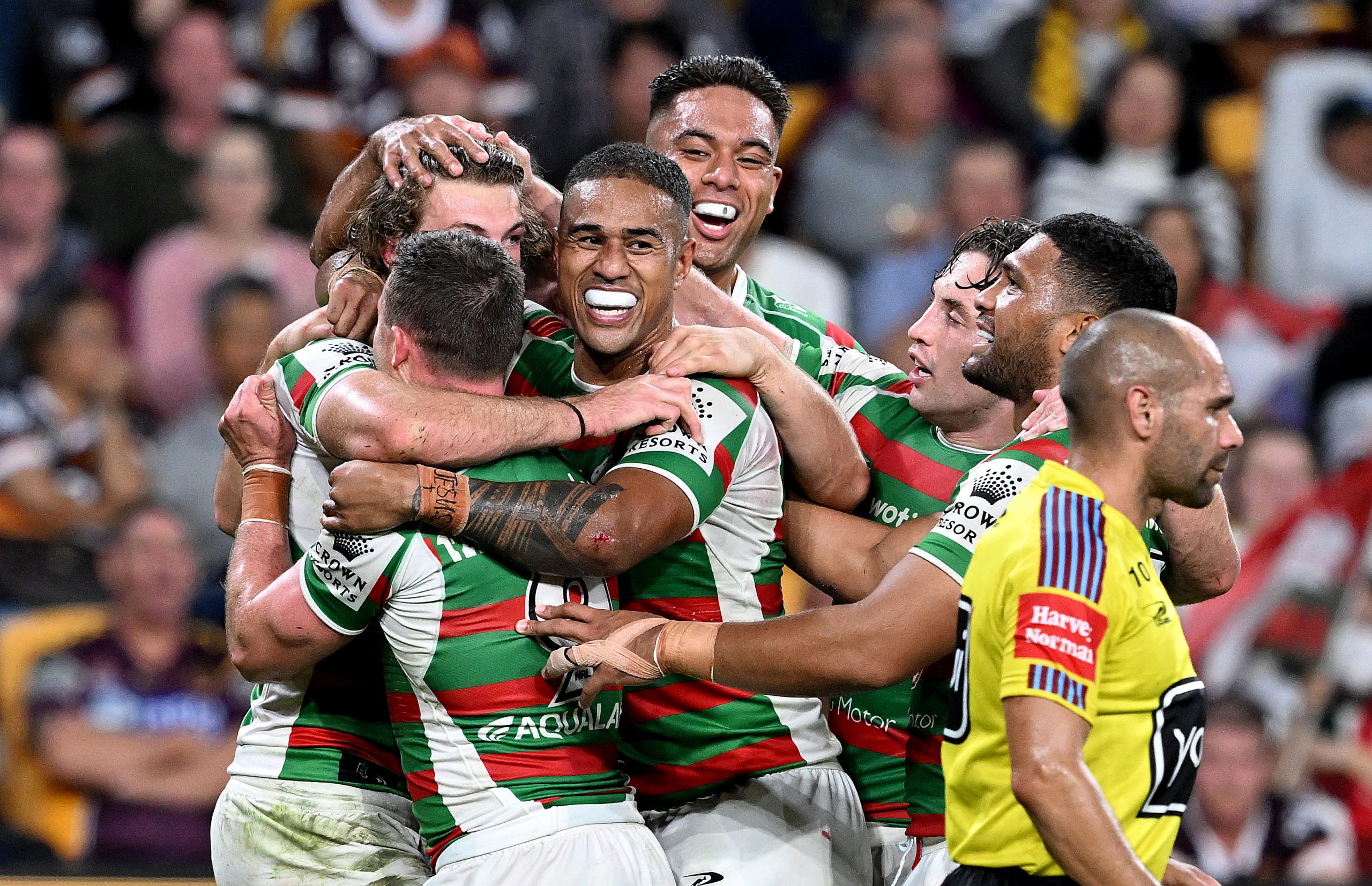 BRISBANE, AUSTRALIA - APRIL 28: Graham Campbell of the Rabbitohs celebrates with team mates after scoring a try during the round nine NRL match between Brisbane Broncos and South Sydney Rabbitohs at Suncorp Stadium on April 28, 2023 in Brisbane, Australia. (Photo by Bradley Kanaris/Getty Images)
