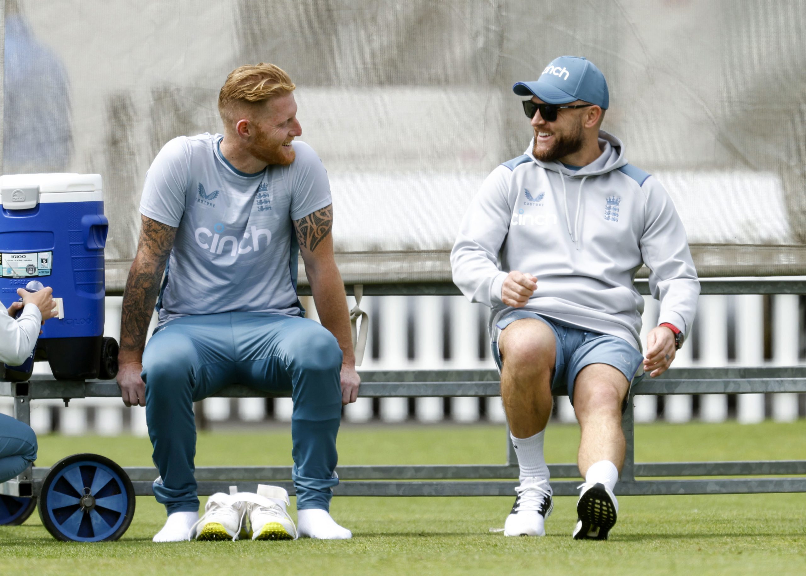 New England captain Ben Stokes, left, and new England men's test coach Brendon McCullum talk to each other during a nets session at Lord's Cricket Ground.