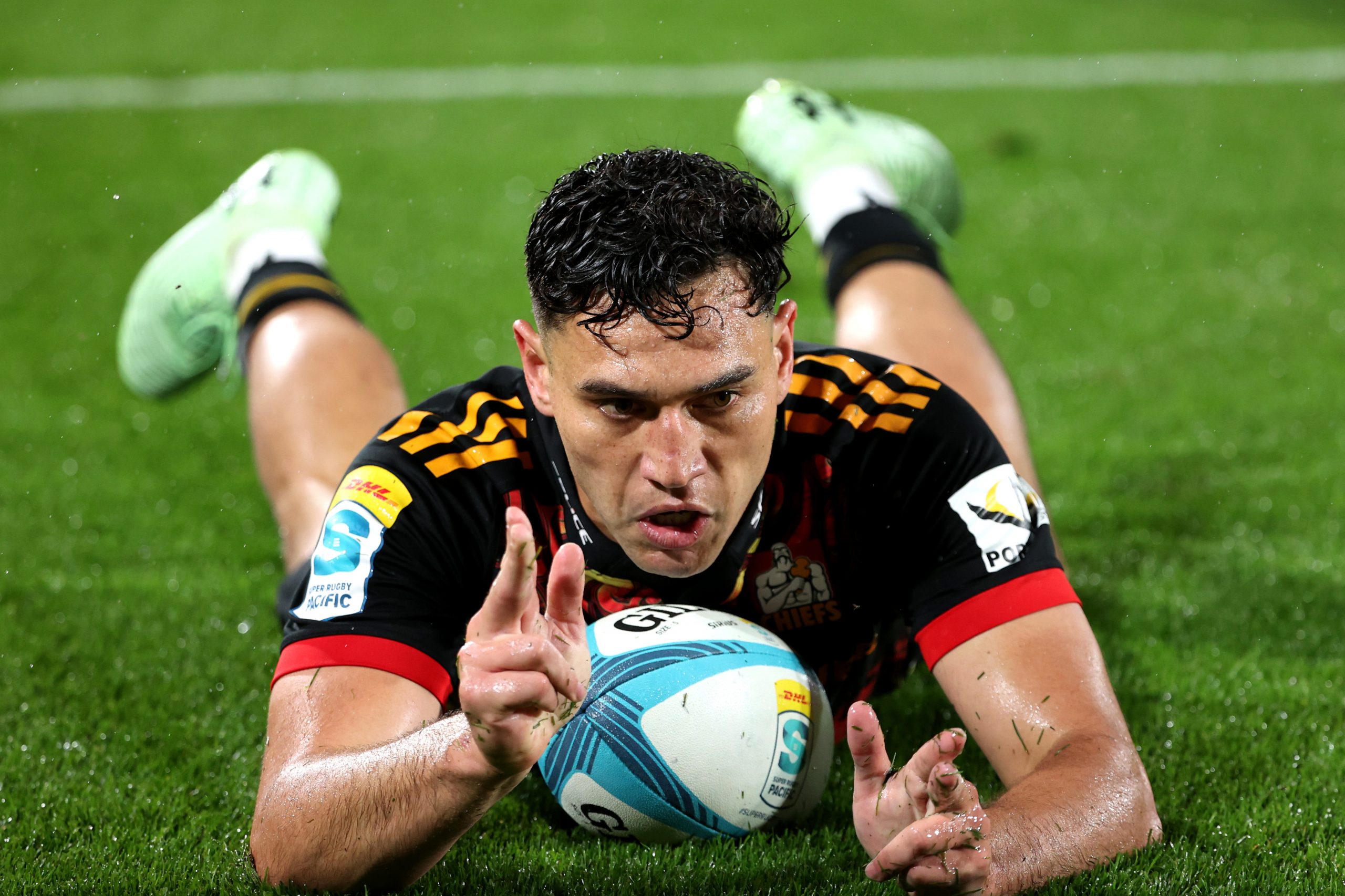 Shaun Stevenson of the Chiefs dives over to score a try.