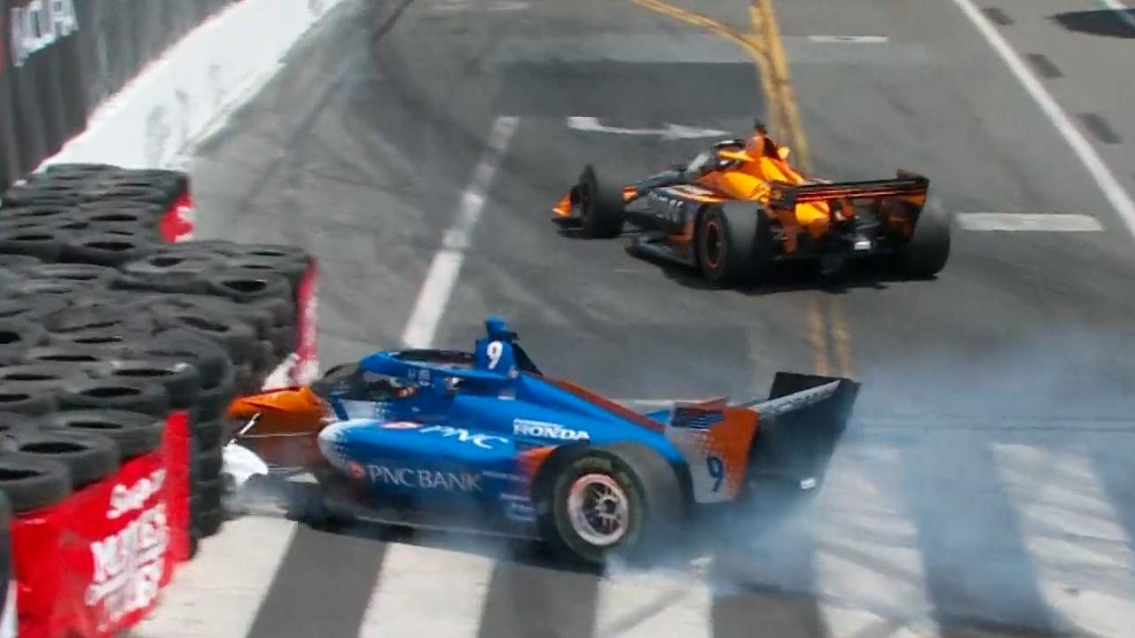 Collision sends IndyCar champ into the wall