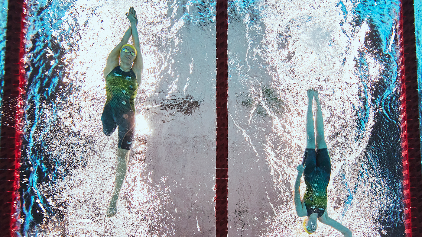 Australia's Ellie Cole (L) and Lakeisha Patterson compete in in the women's 400m Freestyle S9 heats at the Tokyo 2020 Olympics.