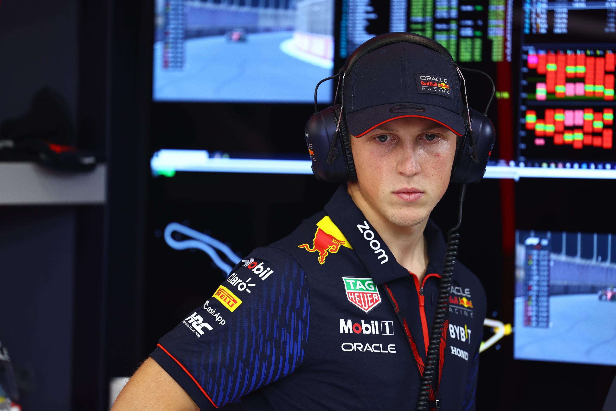 Liam Lawson of New Zealand and Oracle Red Bull Racing looks on in the garage during qualifying ahead of the F1 Grand Prix of Saudi Arabia at Jeddah Corniche Circuit on March 18, 2023 in Jeddah, Saudi Arabia. (Photo by Mark Thompson/Getty Images)