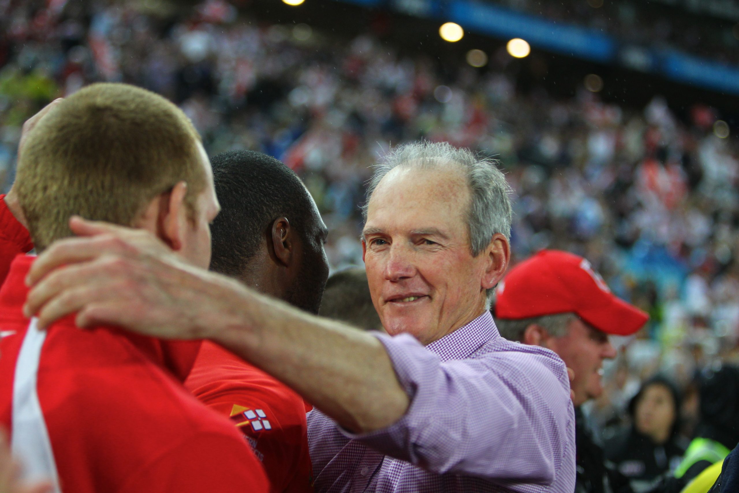 Wayne Bennett celebrates winning the 2010 grand final.