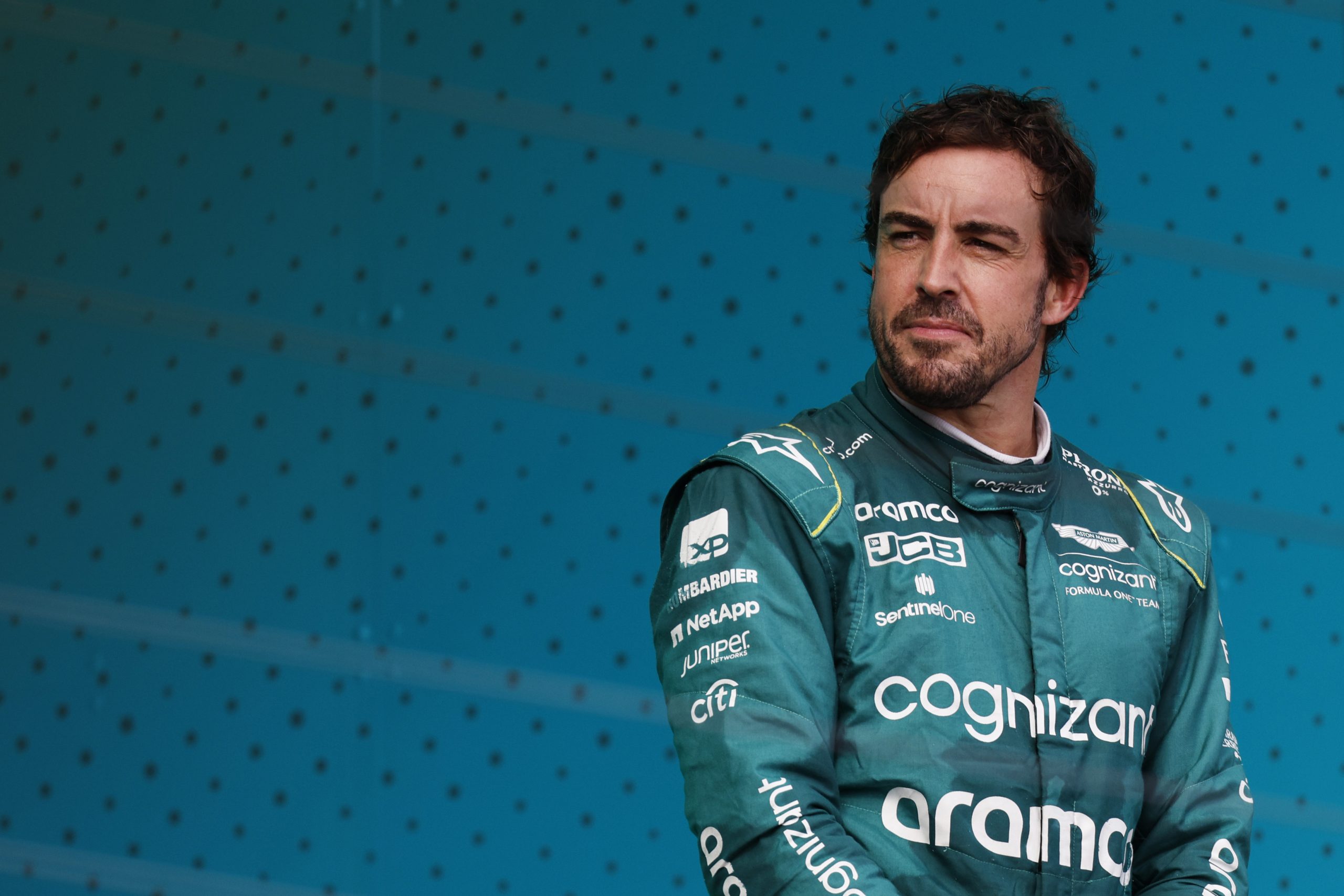 Third placed Fernando Alonso of Spain and Aston Martin celebrates on the podium during the Miami Grand Prix.