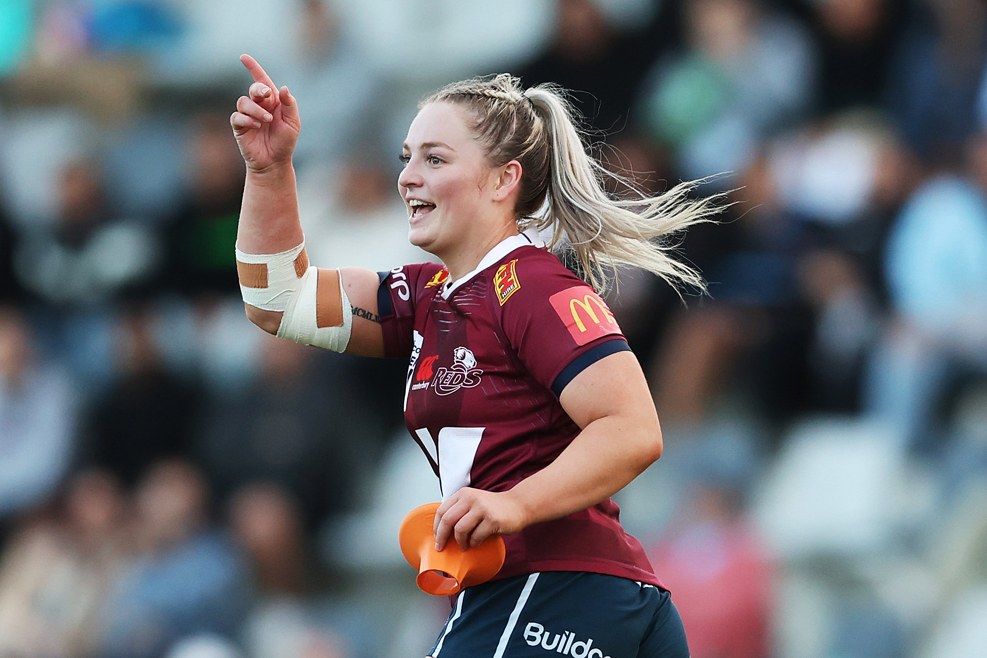 Carys Dallinger of the Reds celebrates kicking the winning penalty.