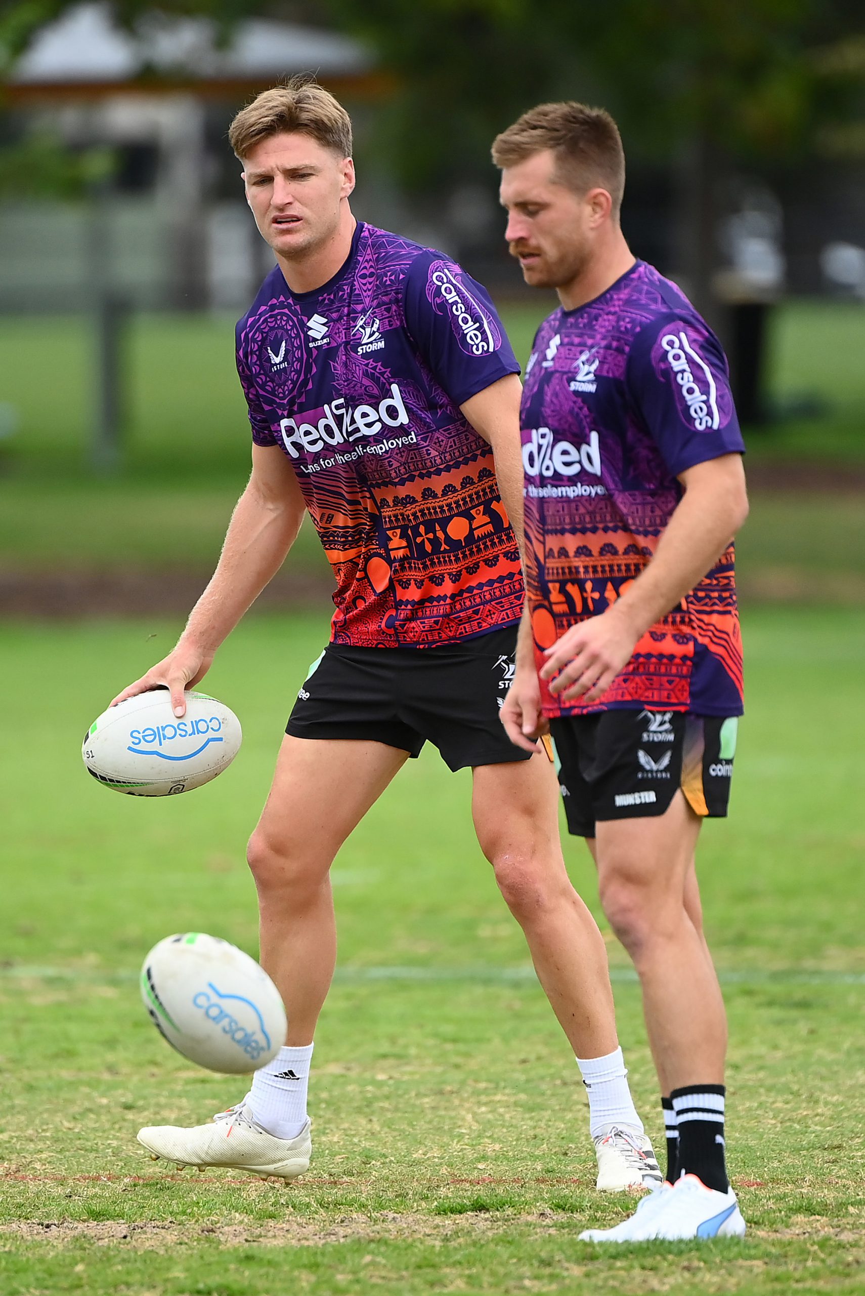 Jordie Barrett of the All Blacks trains with Cameron Munster of the Storm.
