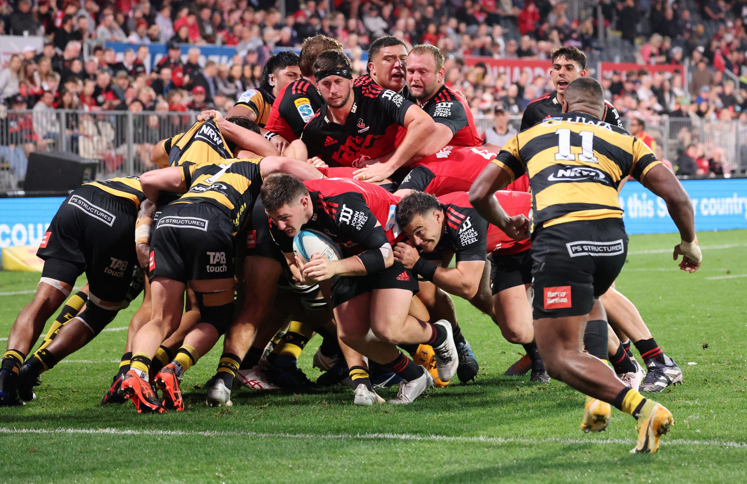 Brodie McAlister dives to score his third try off a maul during the round 11 Super Rugby Pacific match between Crusaders and Western Force.