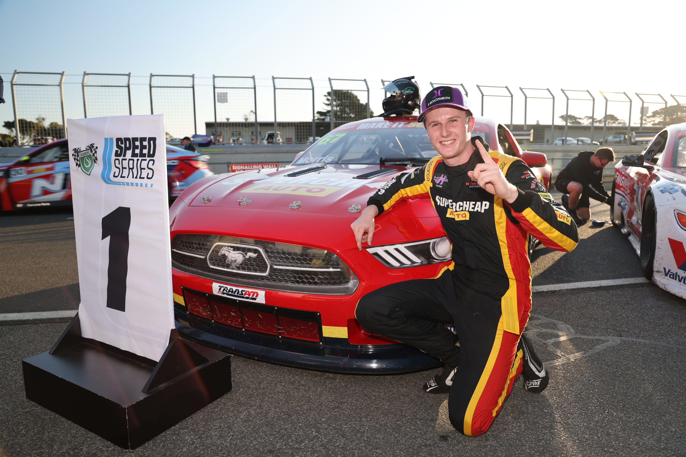 Nash Morris celebrates victory in race three of the National Trans Am Series at Phillip Island.