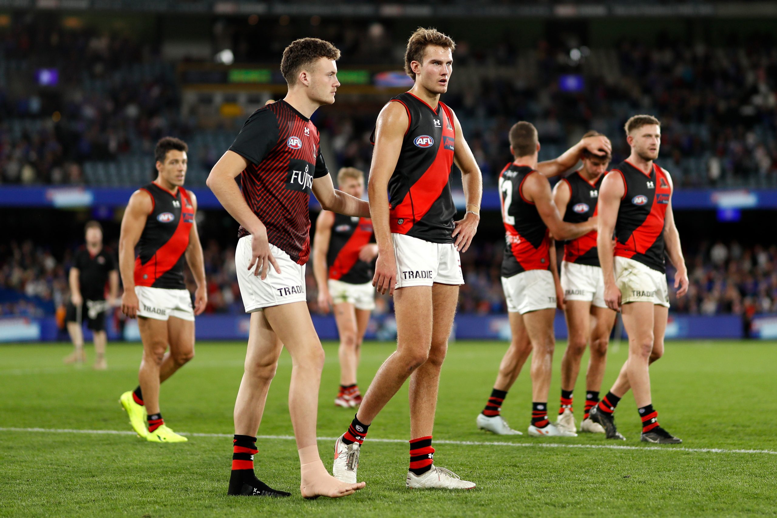 MELBOURNE, AUSTRALIA - MAY 01: Nik Cox and Zach Reid of the Bombers are seen during the 2022 AFL Round 07 match between the Western Bulldogs and the Essendon Bombers at Marvel Stadium on May 01, 2022 in Melbourne, Australia. (Photo by Dylan Burns/AFL Photos)