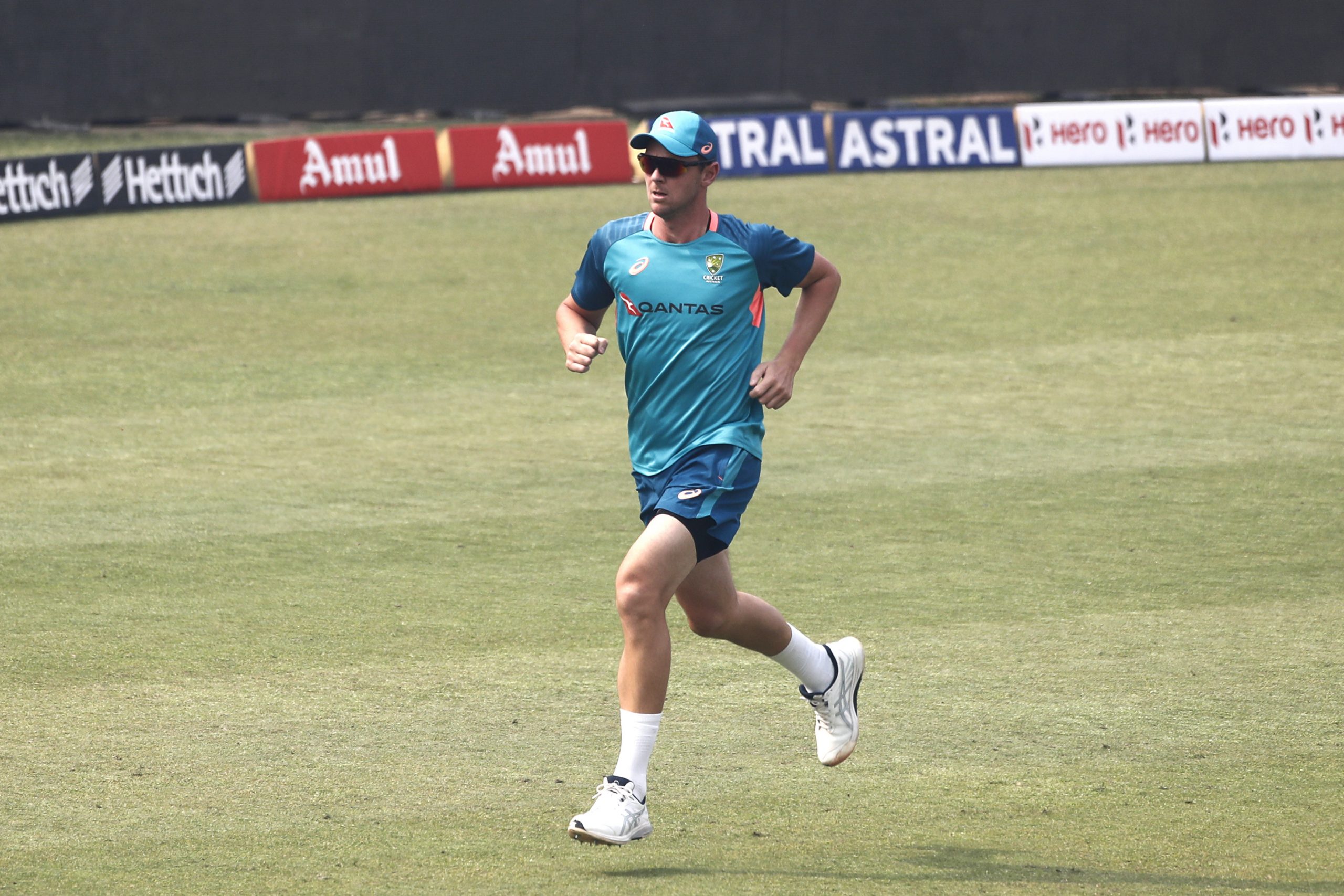 DELHI, INDIA - FEBRUARY 16: Josh Hazlewood of Australia warms up during an Australia Test squad training session at Arun Jaitley Stadium on February 16, 2023 in New Delhi, India. (Photo by Pankaj Nangia/Getty Images)