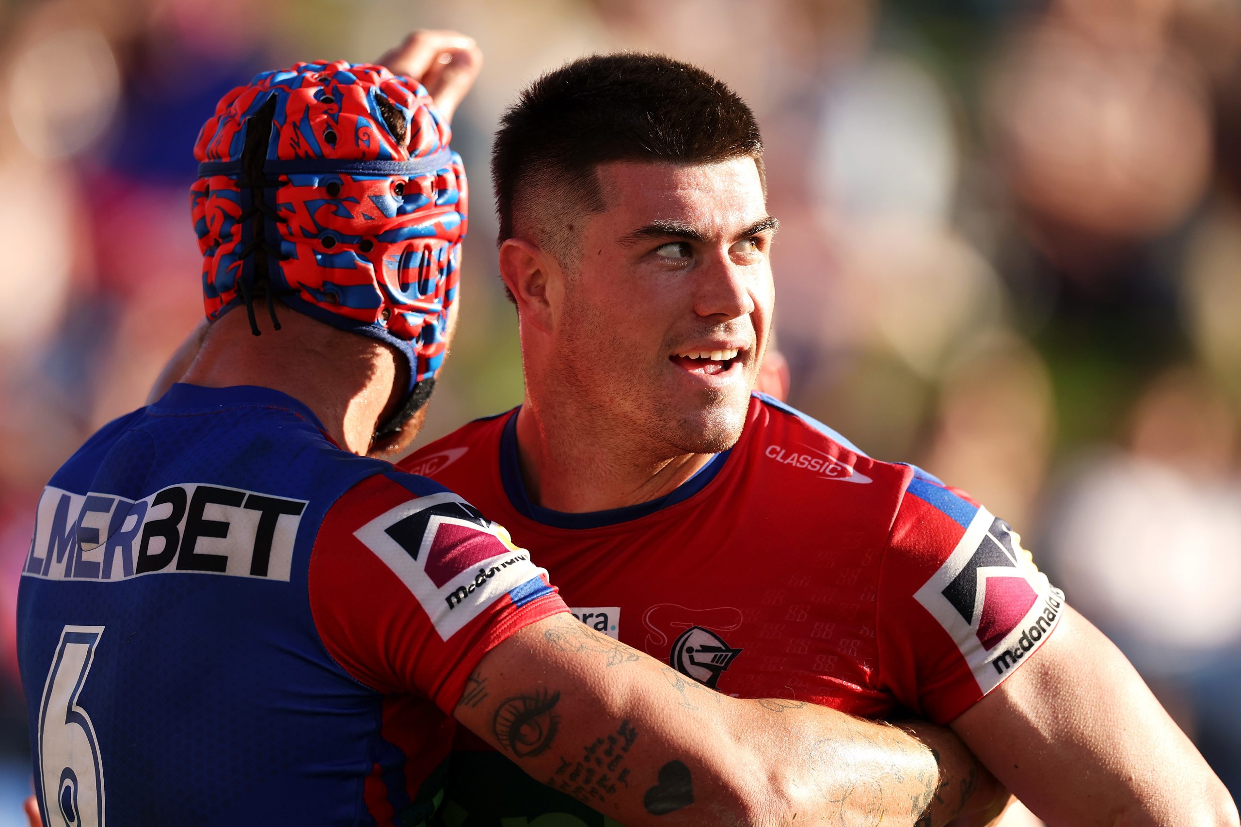 NEWCASTLE, AUSTRALIA - MAY 14: Kalyn Ponga and Bradman Best of the Knights celebrate a try scored by Bradman Best during the round 11 NRL match between Newcastle Knights and Gold Coast Titans at McDonald Jones Stadium on May 14, 2023 in Newcastle, Australia. (Photo by Mark Kolbe/Getty Images)