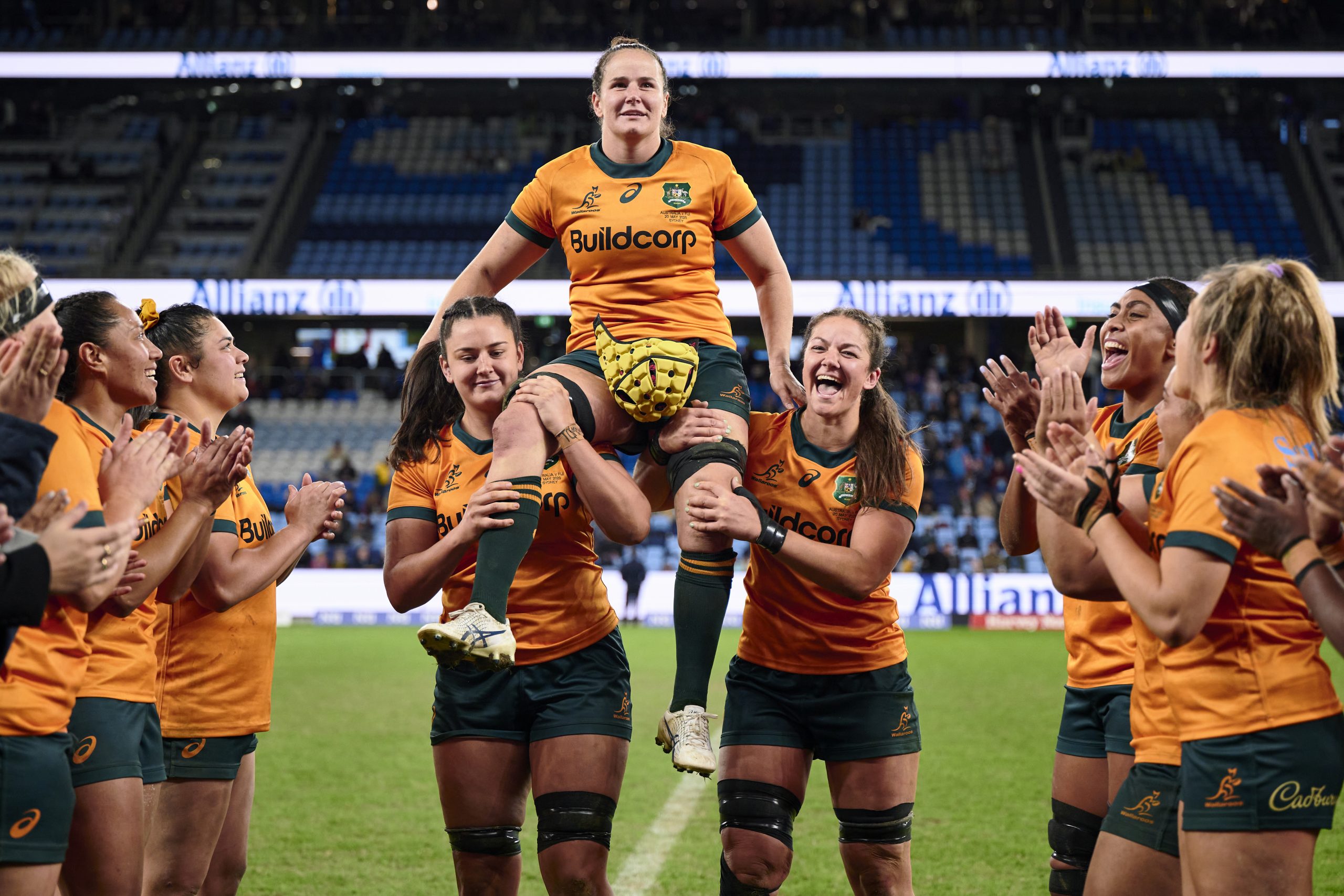 Outgoing Wallaroos captain Shannon Parry is lofted into the air for a guard of honour.
