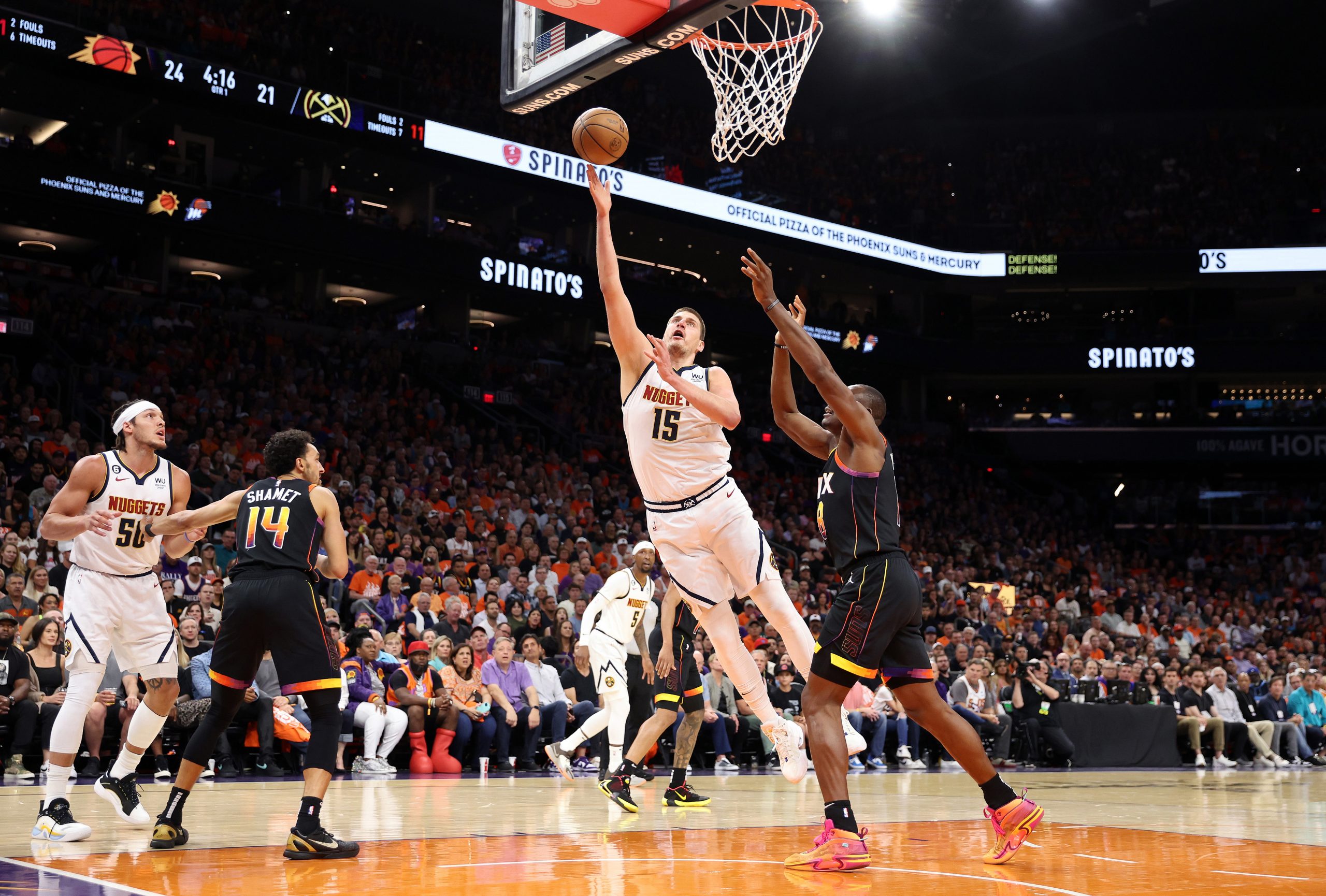 PHOENIX, ARIZONA - MAY 11: Nikola Jokic #15 of the Denver Nuggets drives to the basket during the first quarter against the Phoenix Suns in game six of the Western Conference Semifinal Playoffs at Footprint Center on May 11, 2023 in Phoenix, Arizona. NOTE TO USER: User expressly acknowledges and agrees that, by downloading and or using this photograph, User is consenting to the terms and conditions of the Getty Images License Agreement. (Photo by Christian Petersen/Getty Images)