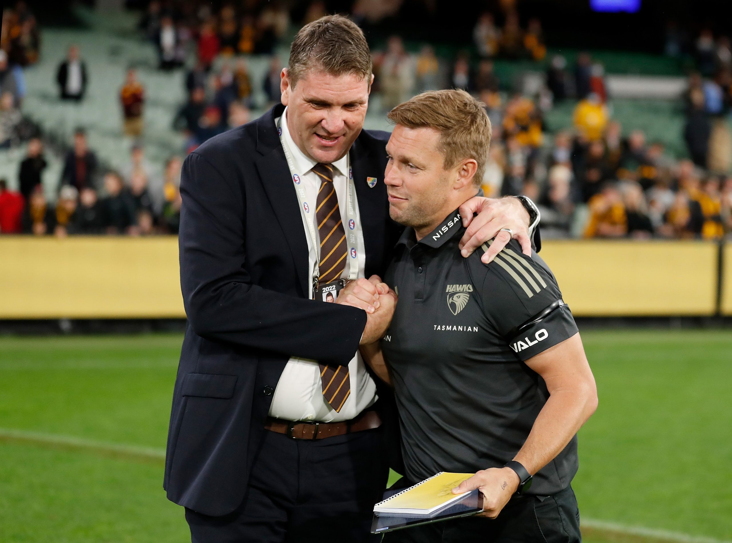 Hawks CEO Justin Reeves and senior coach Sam Mitchell.