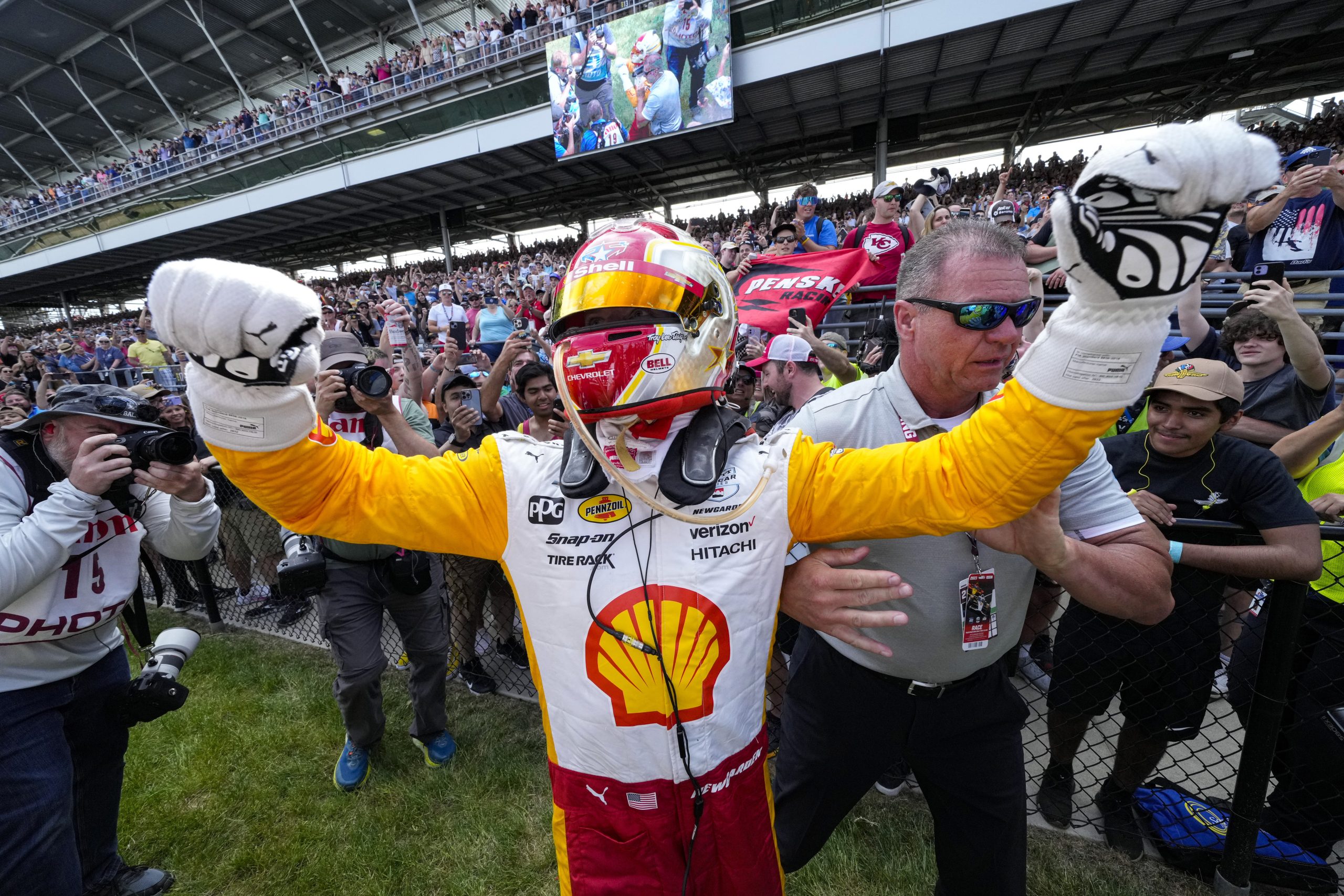 Josef Newgarden celebrated with fans after winning the Indianapolis 500.