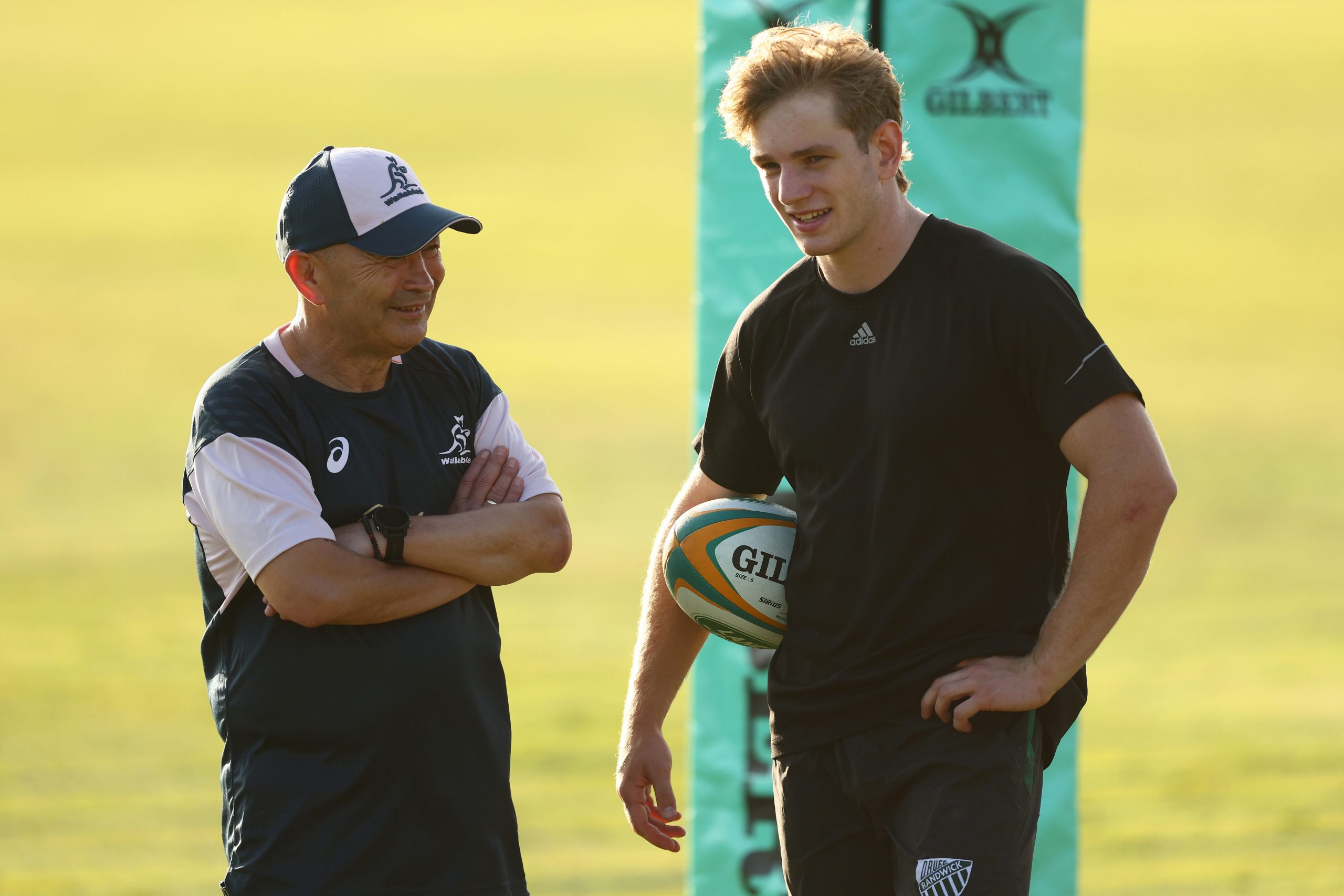 Wallabies coach Eddie Jones talks with Max Jorgensen.