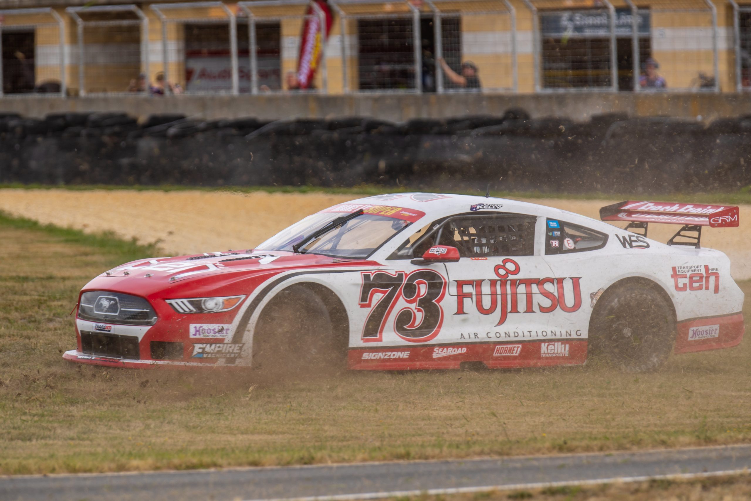 Owen Kelly spins in the grass.