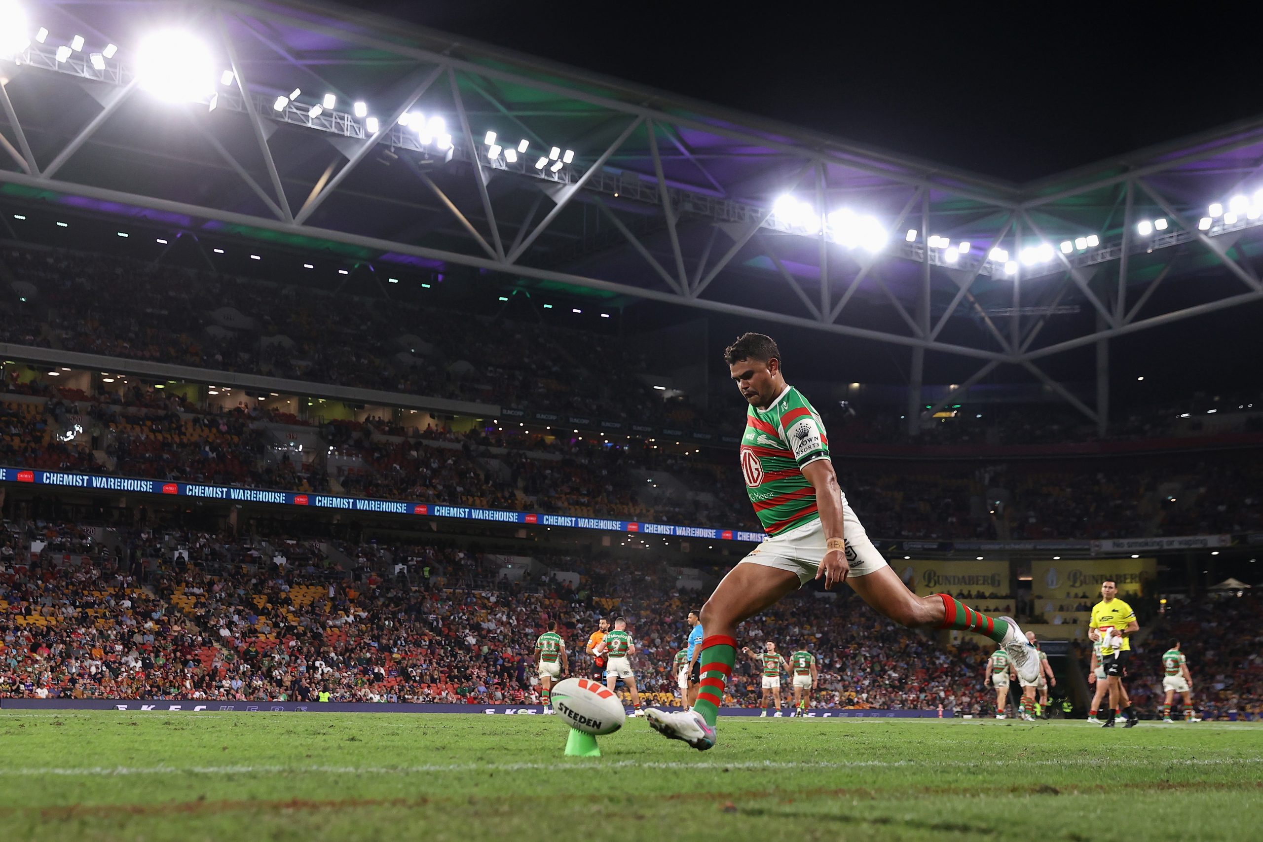 Latrell Mitchell of the Rabbitohs kicks a conversion during Magic Round.