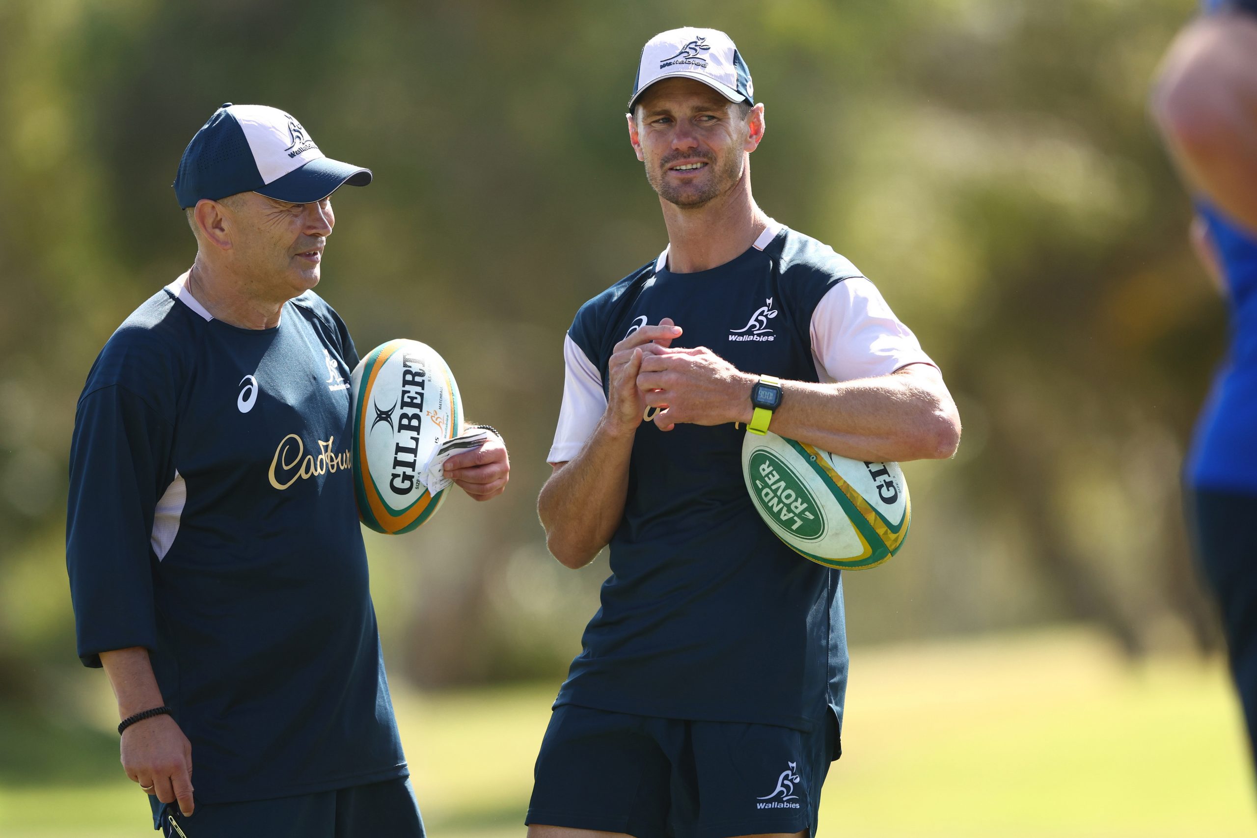 Wallabies coach Eddie Jones (left) and assistant coach Berrick Barnes during an Australia Wallabies training camp at Sanctuary Cove.