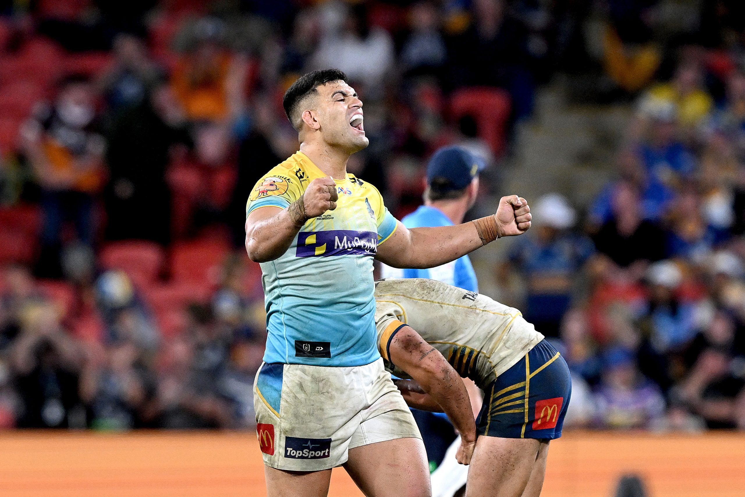 BRISBANE, AUSTRALIA - MAY 07: David Fifita of the Titans celebrates victory after the round 10 NRL match between Gold Coast Titans and Parramatta Eels at Suncorp Stadium on May 07, 2023 in Brisbane, Australia. (Photo by Bradley Kanaris/Getty Images)