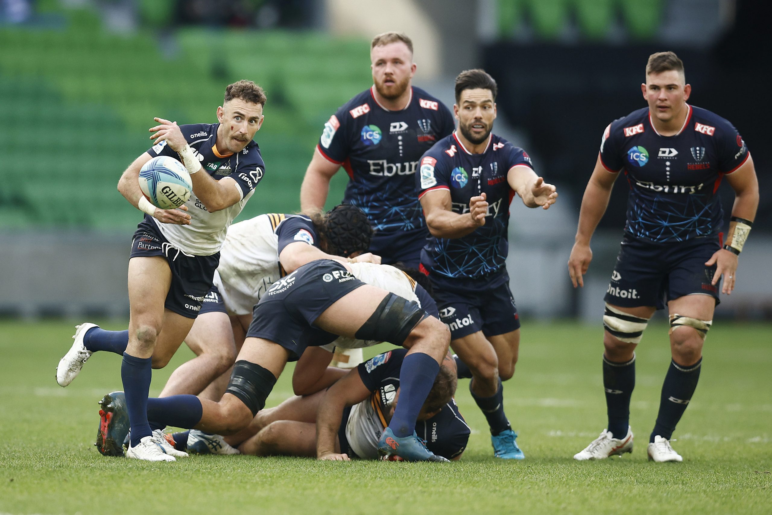 Nic White of the Brumbies passes the ball during the round 11 Super Rugby Pacific match against the Melbourne Rebels.