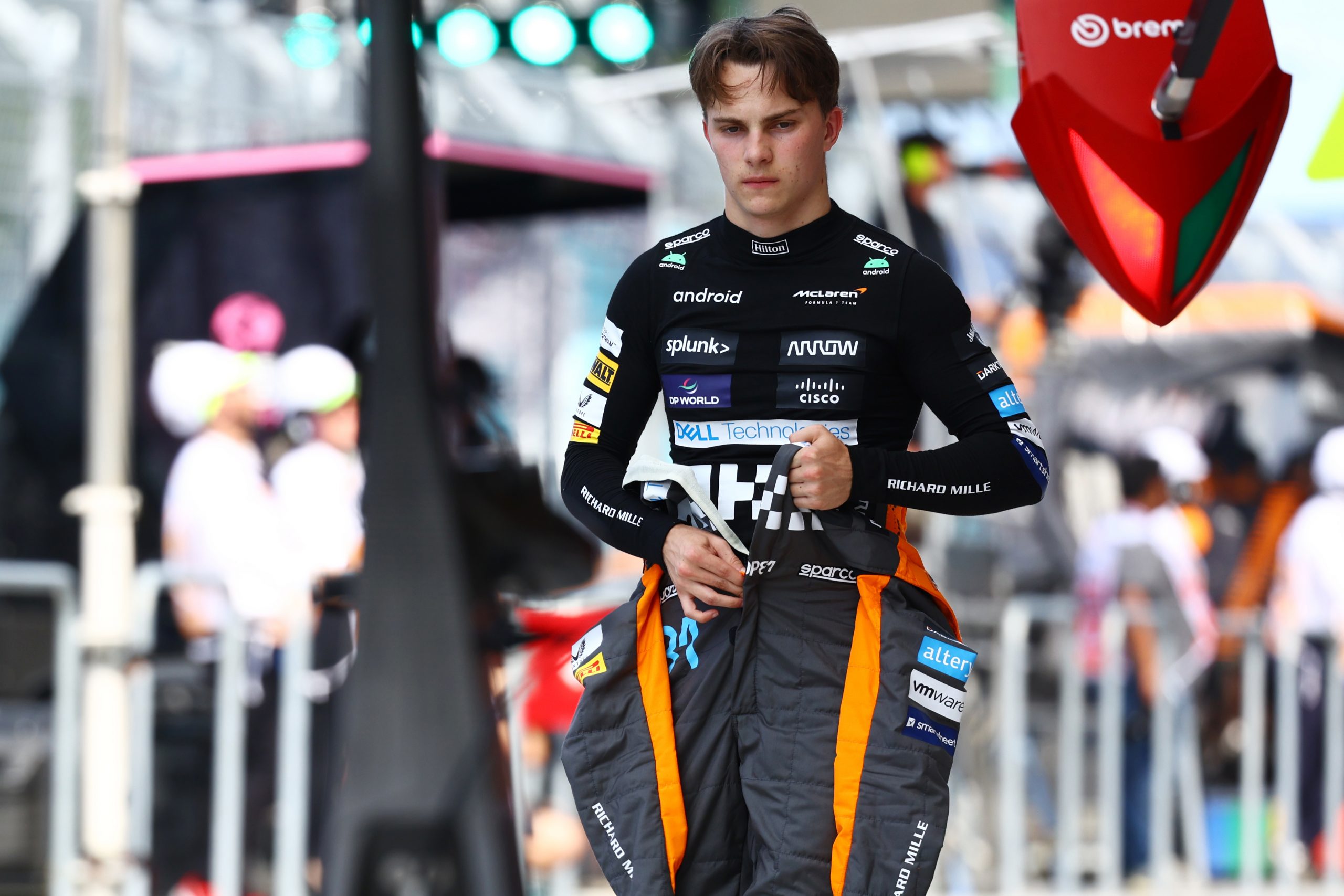 Oscar Piastri of Australia and McLaren walks in the Pitlane during qualifying ahead of the F1 Grand Prix of Miami at Miami International Autodrome on May 06, 2023 in Miami, Florida. (Photo by Mark Thompson/Getty Images)