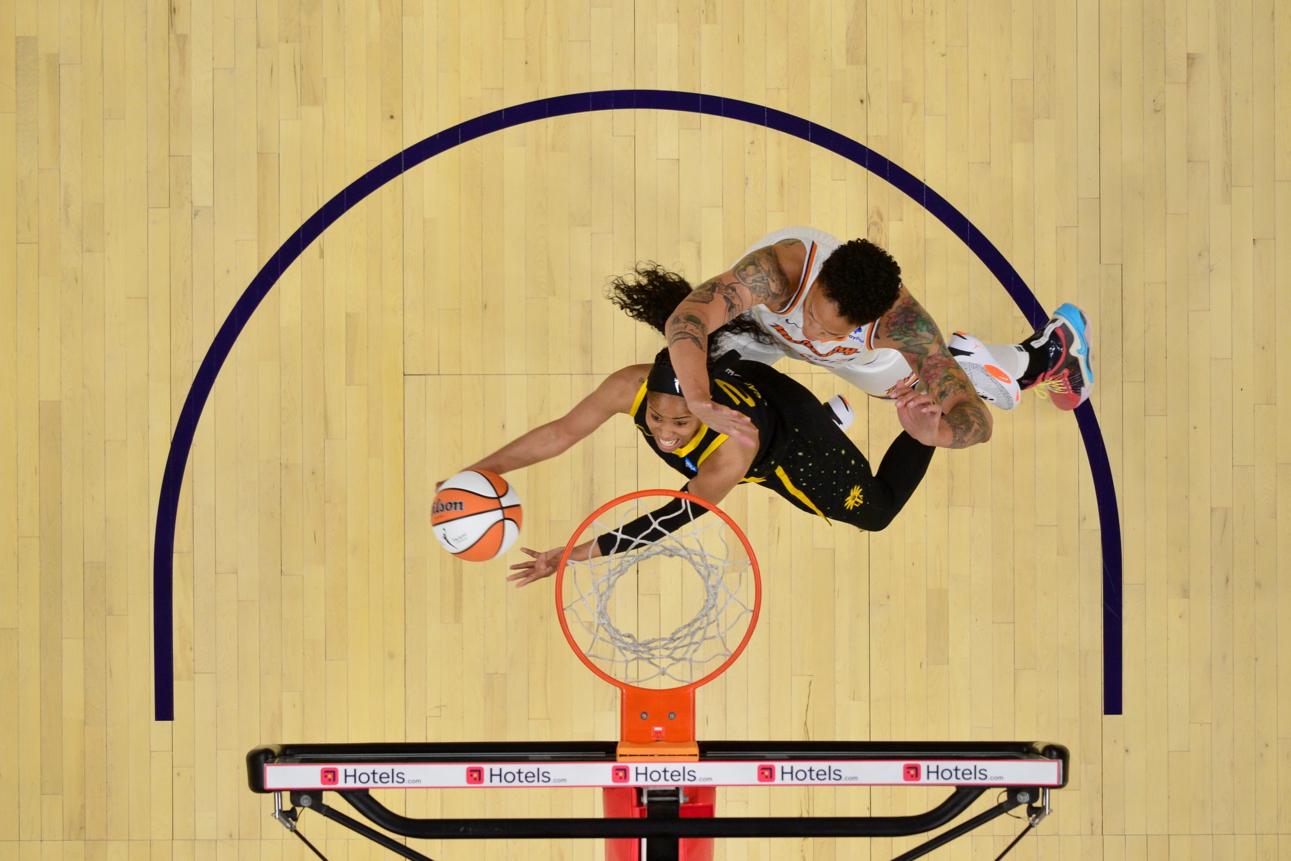 Jordin Canada #21 of the Los Angeles Sparks drives to the basket during the game against the Phoenix Mercury on May 12, 2023 at Footprint Center in Phoenix, Arizona. 