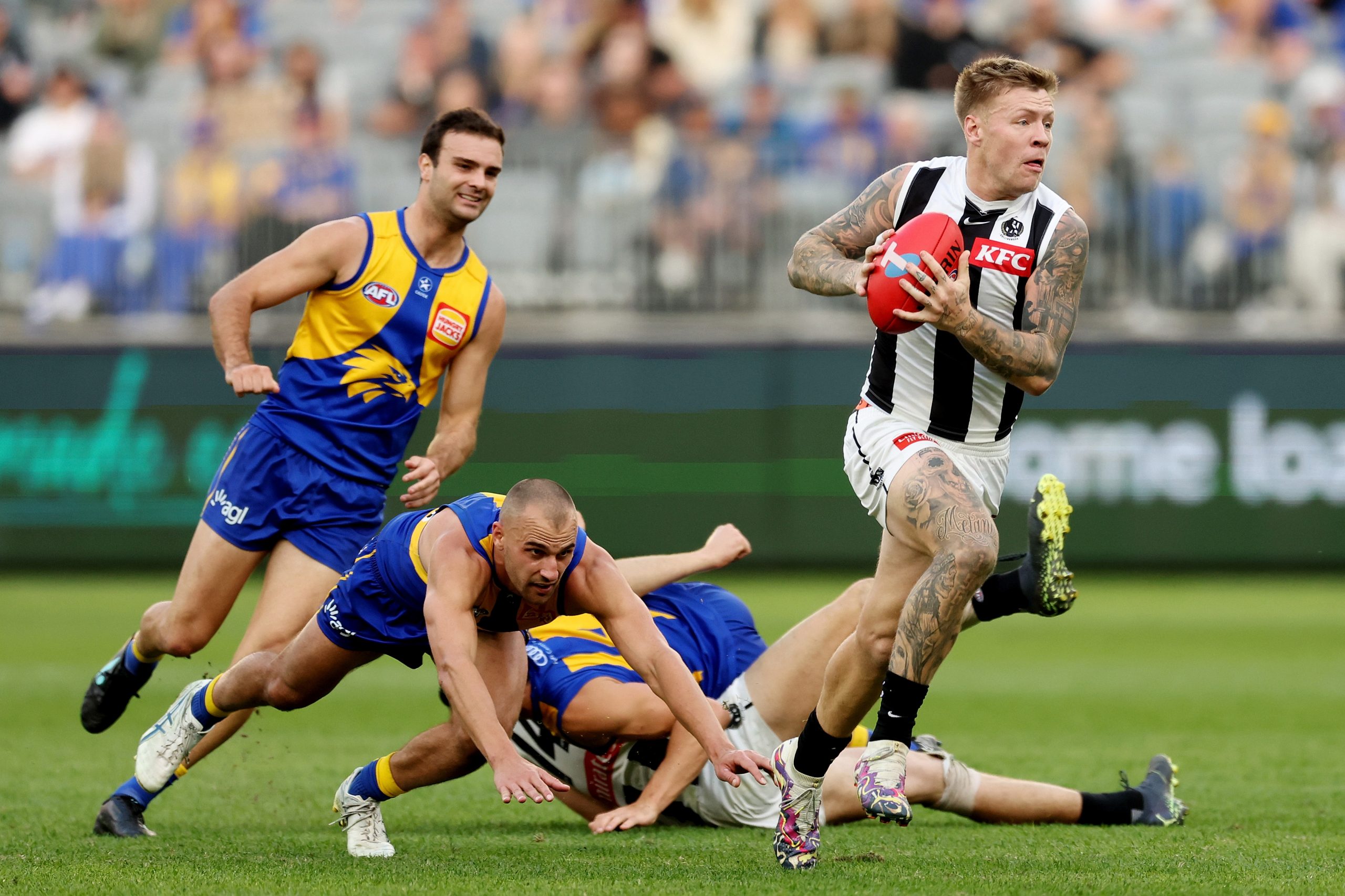 PERTH, AUSTRALIA - JUNE 03: Jordan De Goey of the Magpies breaks through the defence during the 2023 AFL Round 12 match between the West Coast Eagles and the Collingwood Magpies at Optus Stadium on June 3, 2023 in Perth, Australia. (Photo by Will Russell/AFL Photos via Getty Images)