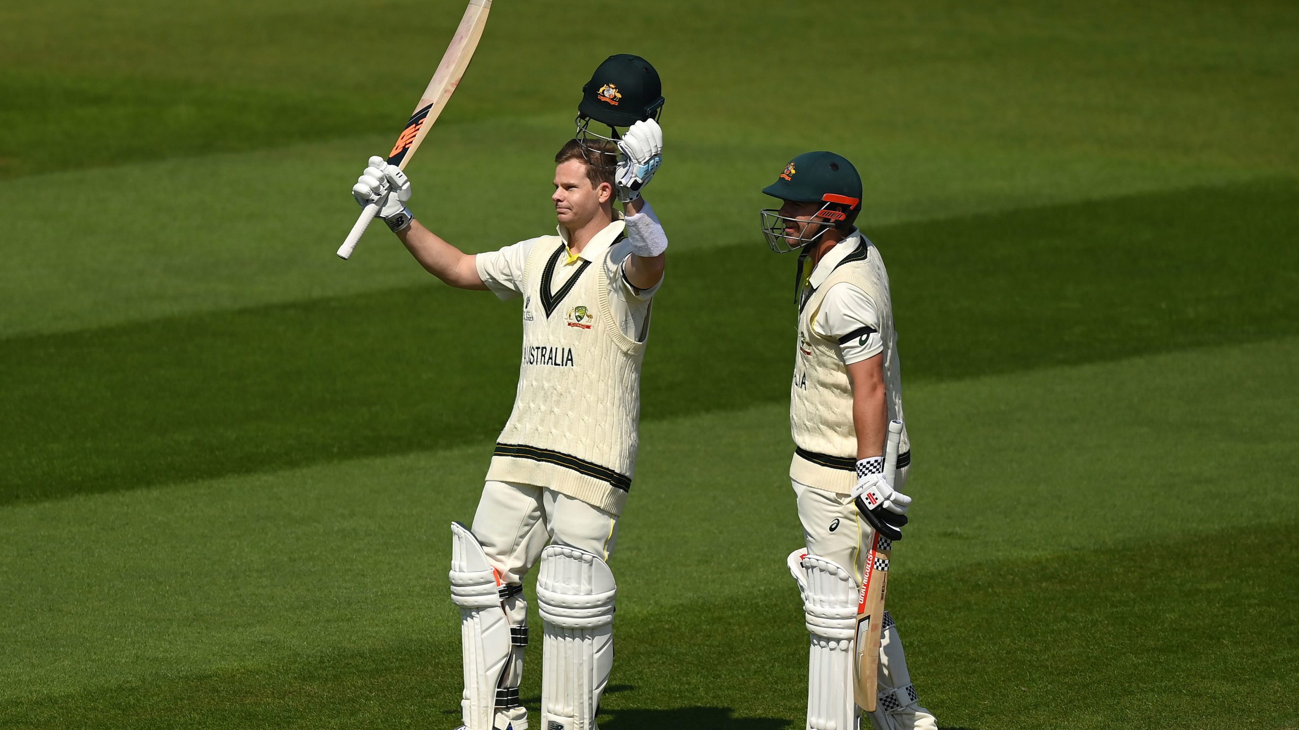 Steve Smith celebrates his century alongside teammate Travis Head during day two of the ICC World Test Championship Final between Australia and India at The Oval.