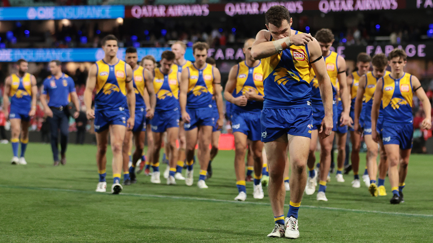 Eagles captain Luke Shuey walks from the field after a heavy defeat from the Swans in round 15.